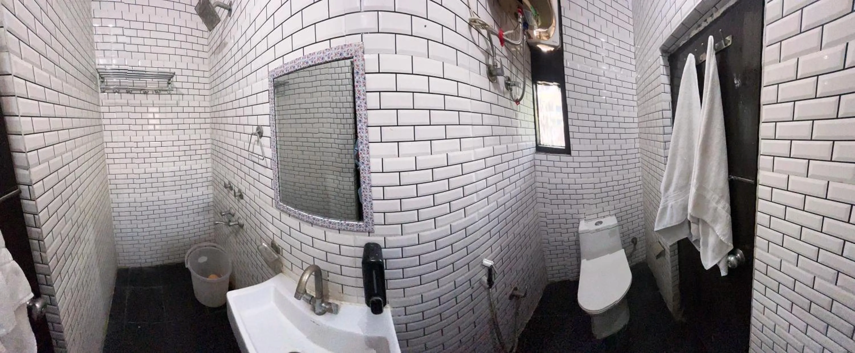 Bathroom in HOTEL DARPAN PALACE -New Delhi Railway Station