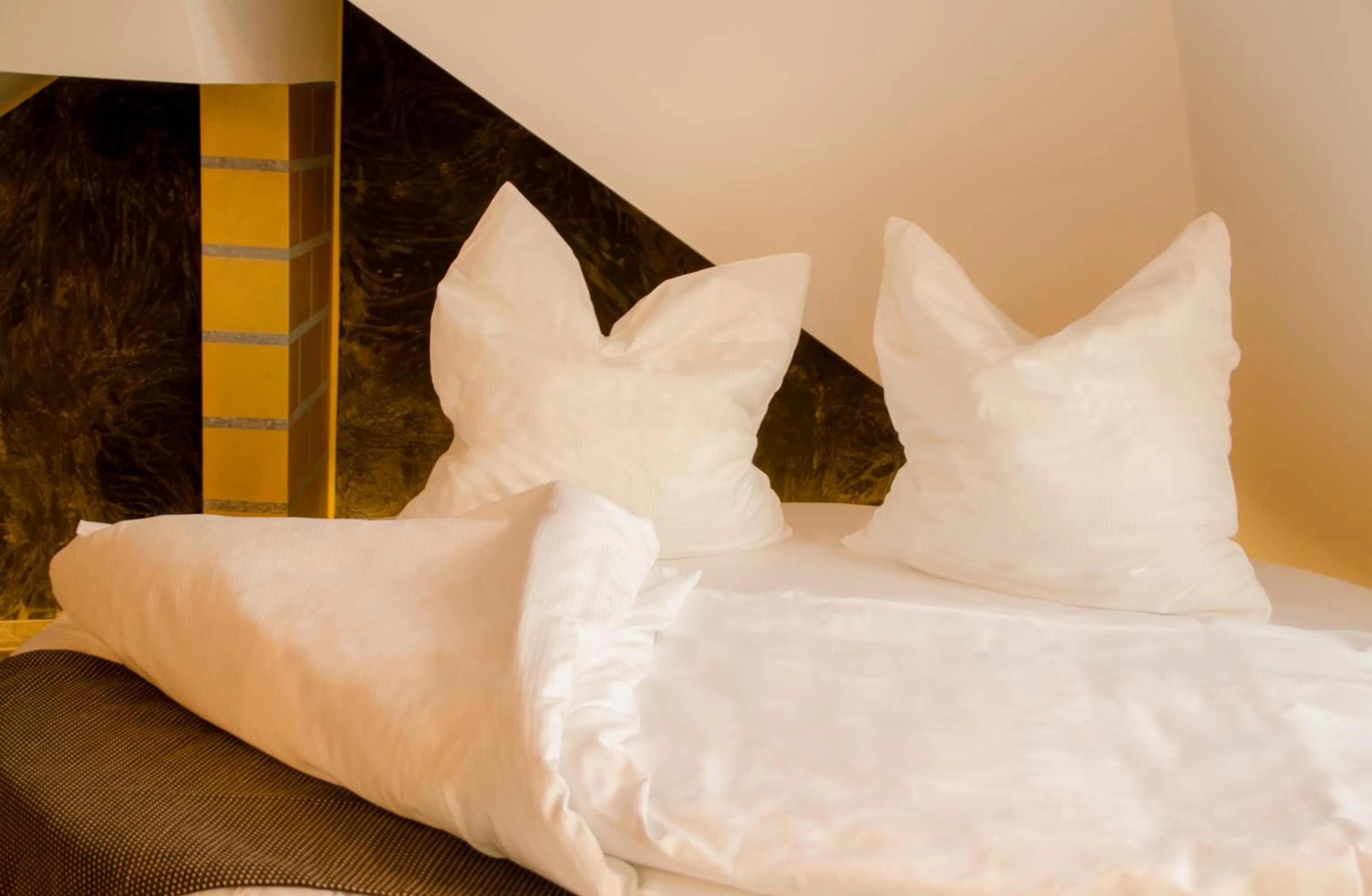 Bed in Alpha & Omega Hotel Stuttgart