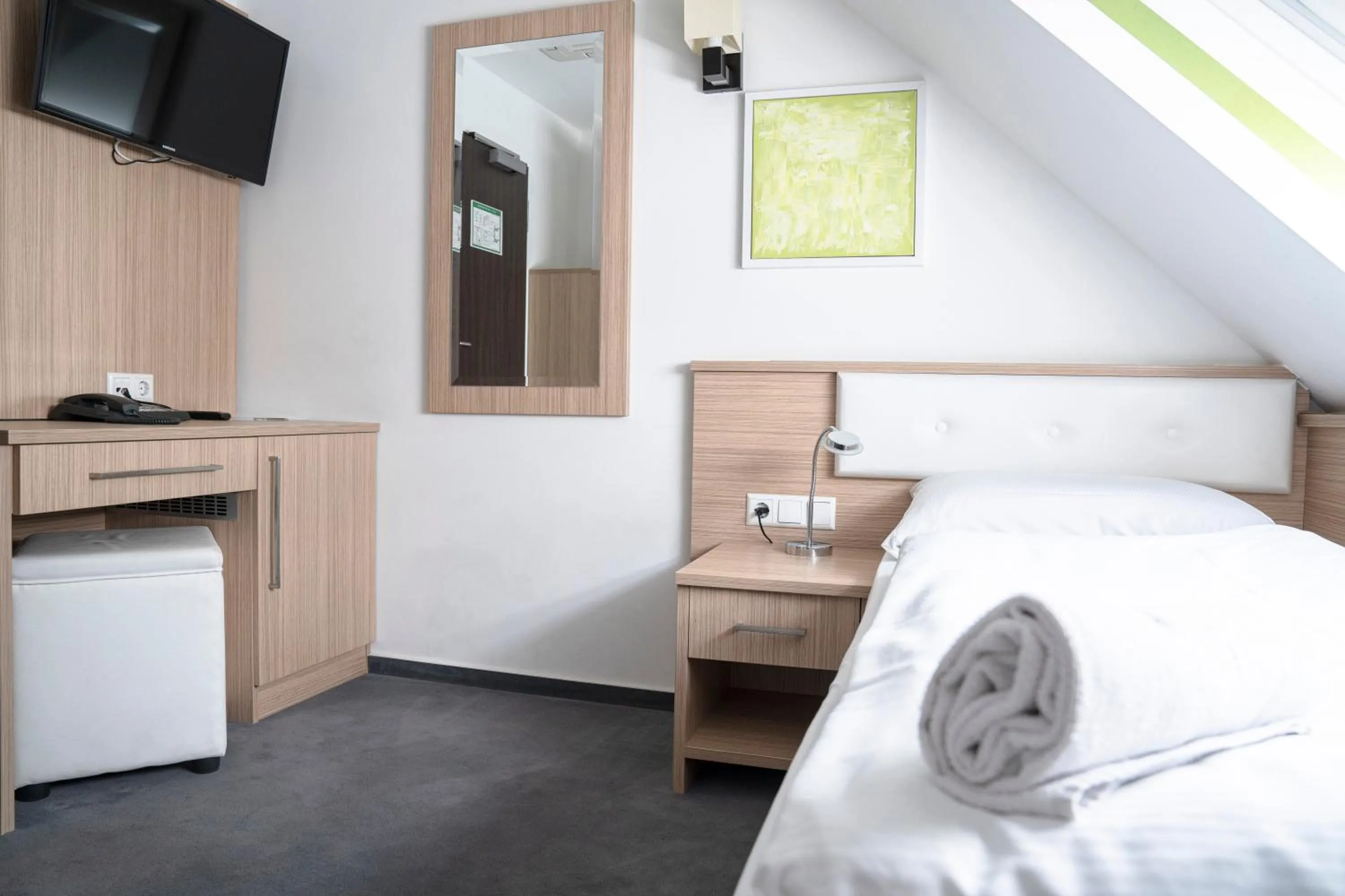 Bed in Alpha & Omega Hotel Stuttgart