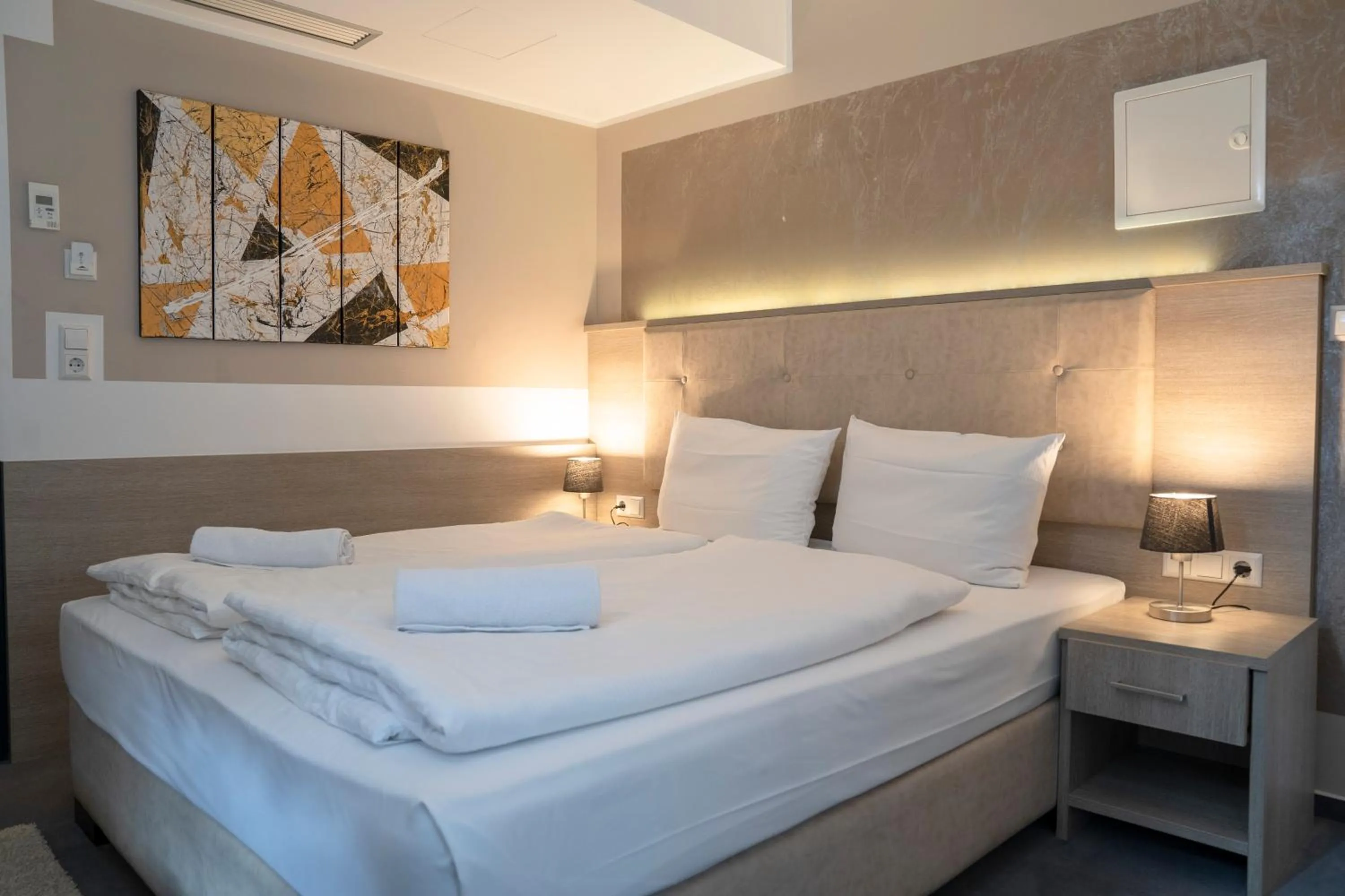 Bed in Alpha & Omega Hotel Stuttgart