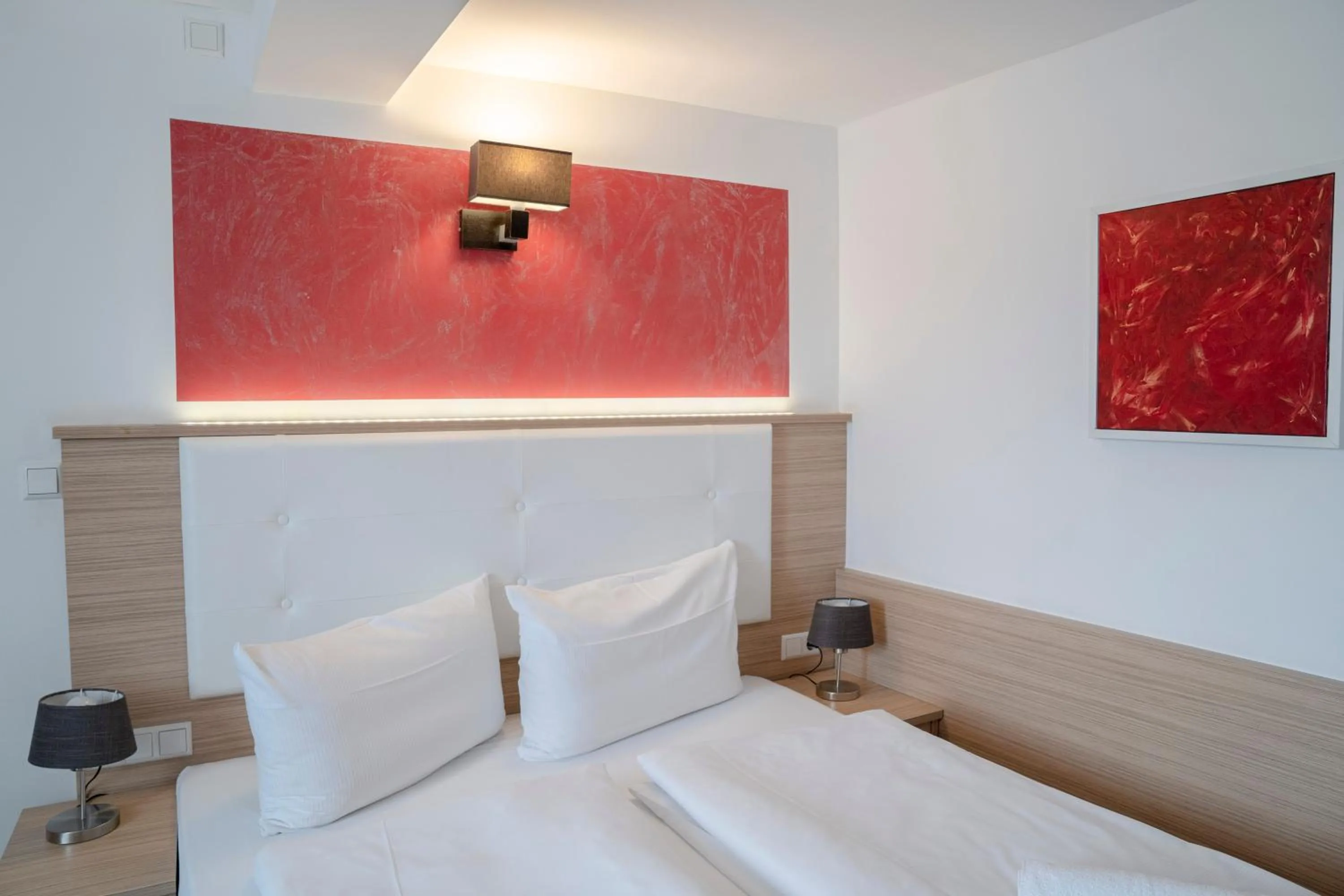 Bed in Alpha & Omega Hotel Stuttgart