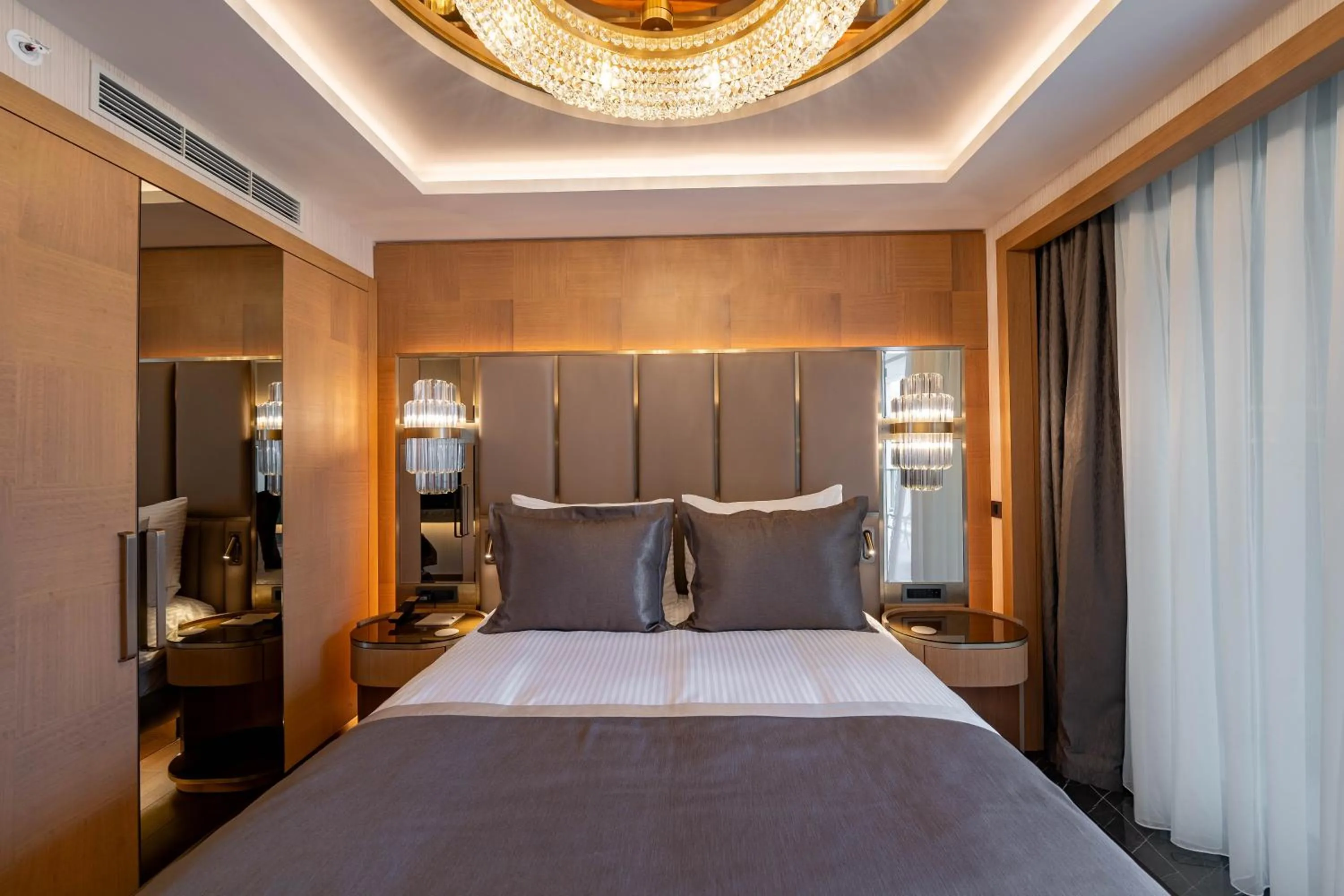 Bed in Merit Starlit Hotel & Residences