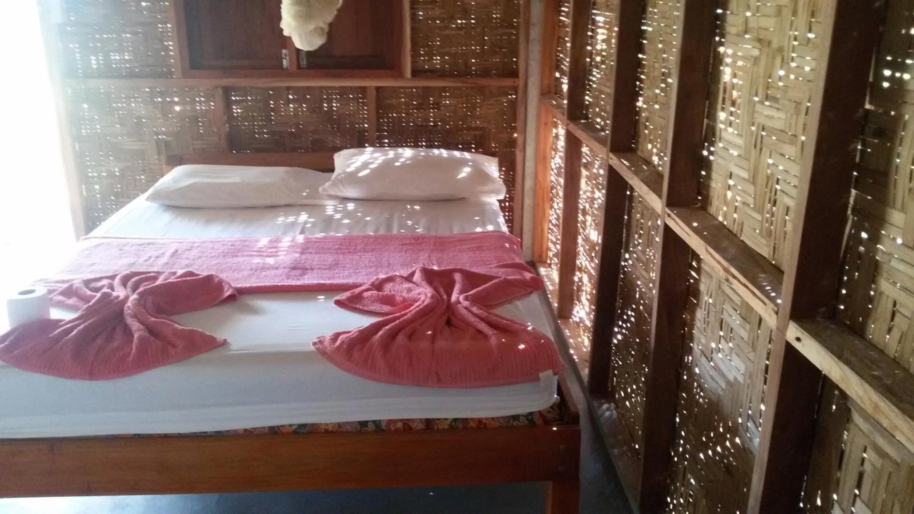 Bed in Green Chilli Bungalows