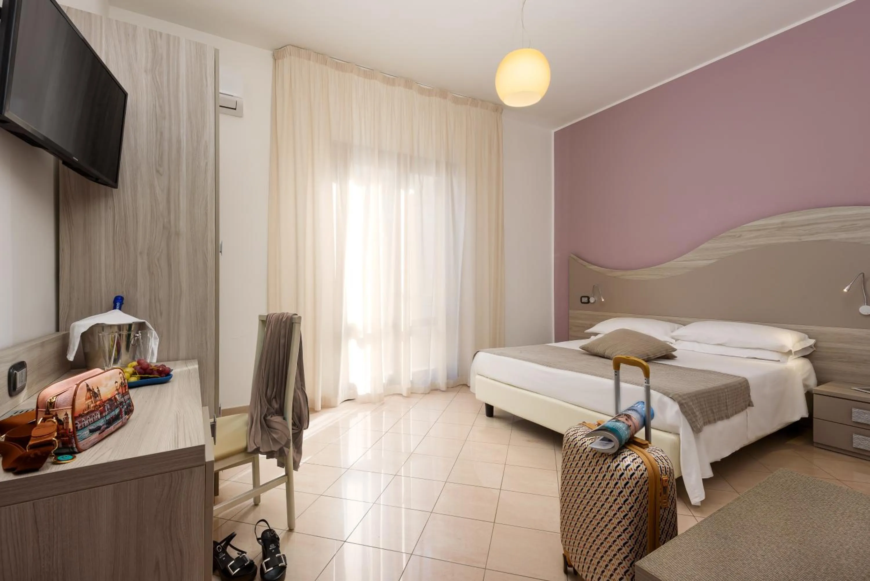 Bed in La Conchiglia sul mare Hotel