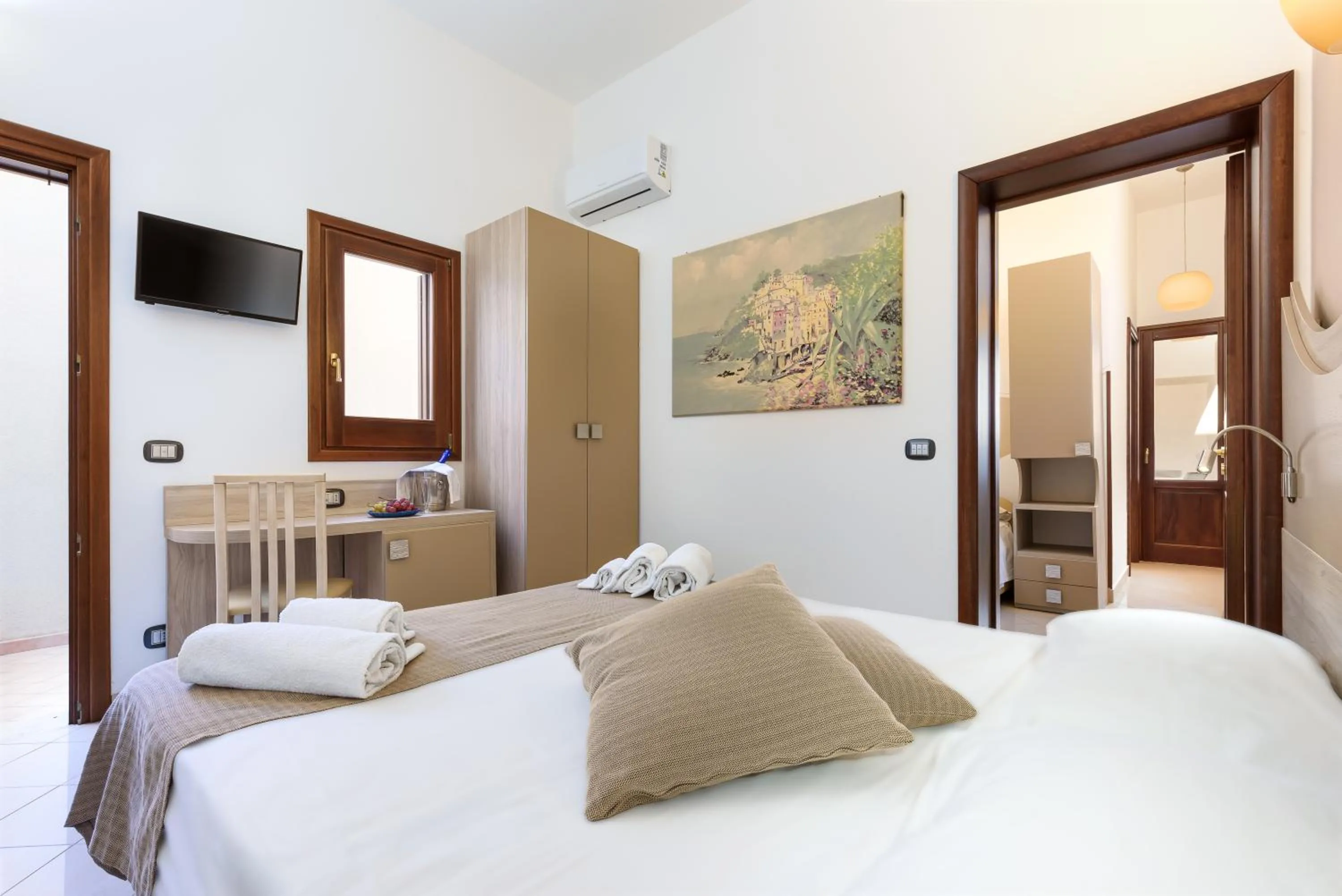 Bed in La Conchiglia sul mare Hotel