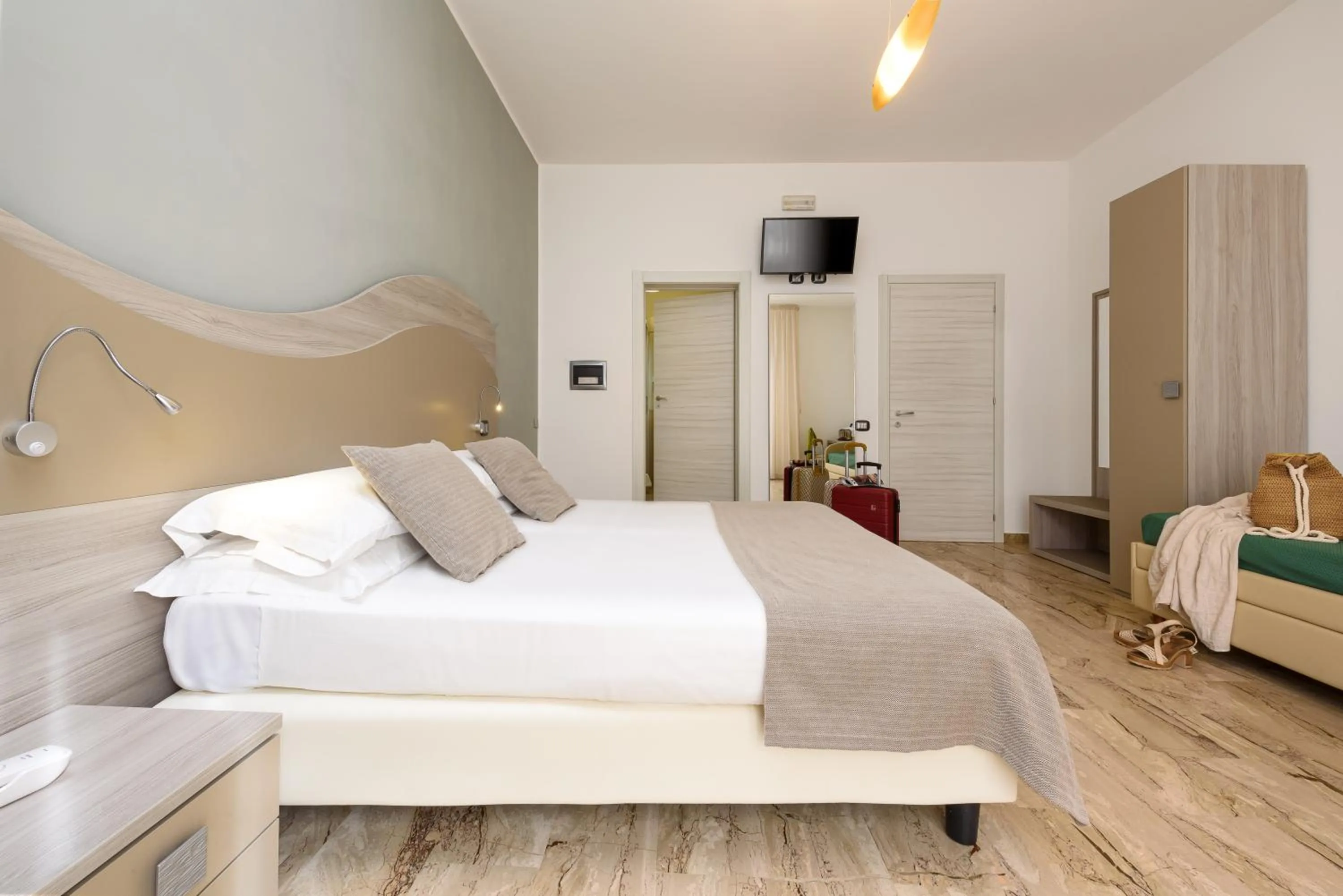 Bed in La Conchiglia sul mare Hotel