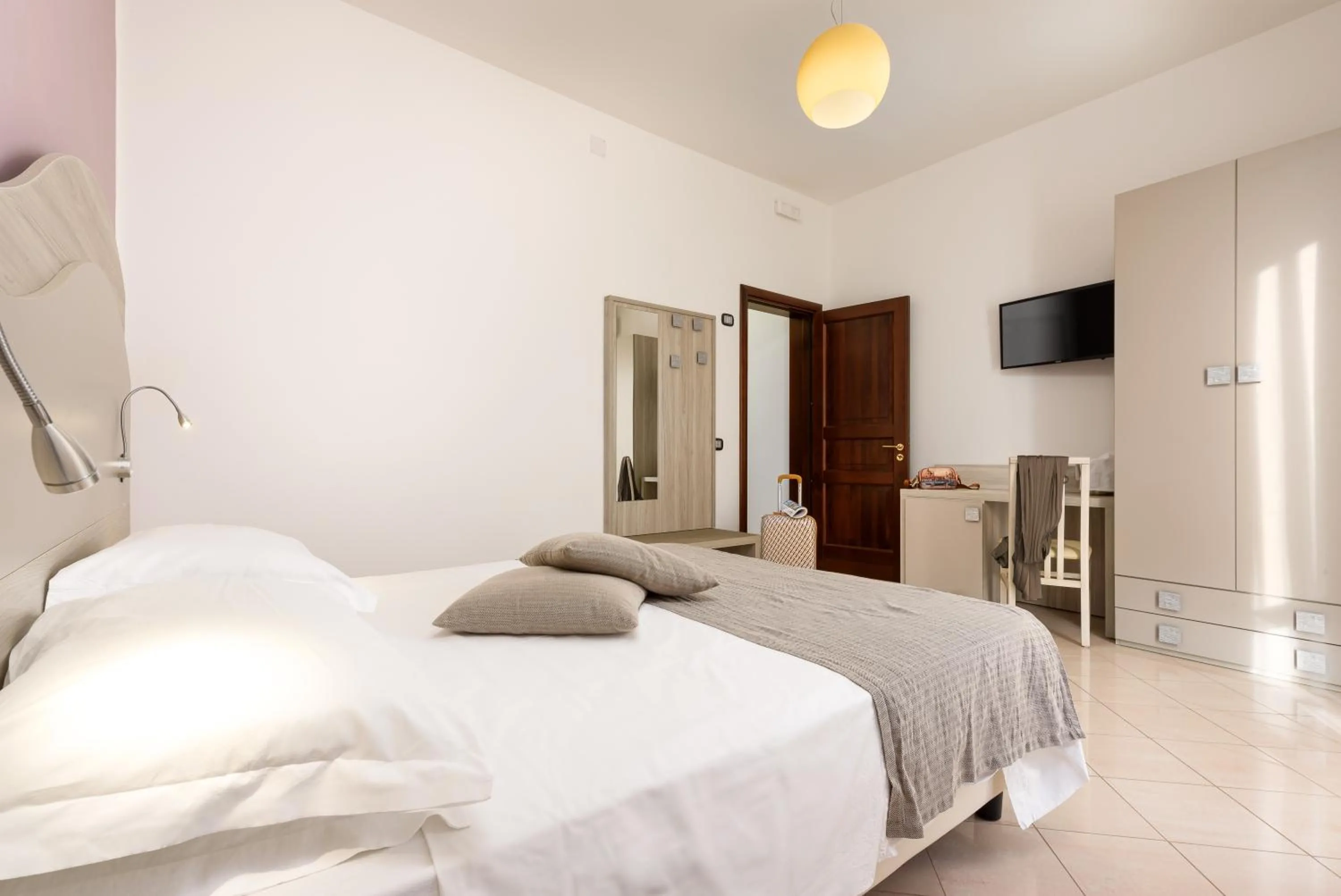 Bed in La Conchiglia sul mare Hotel