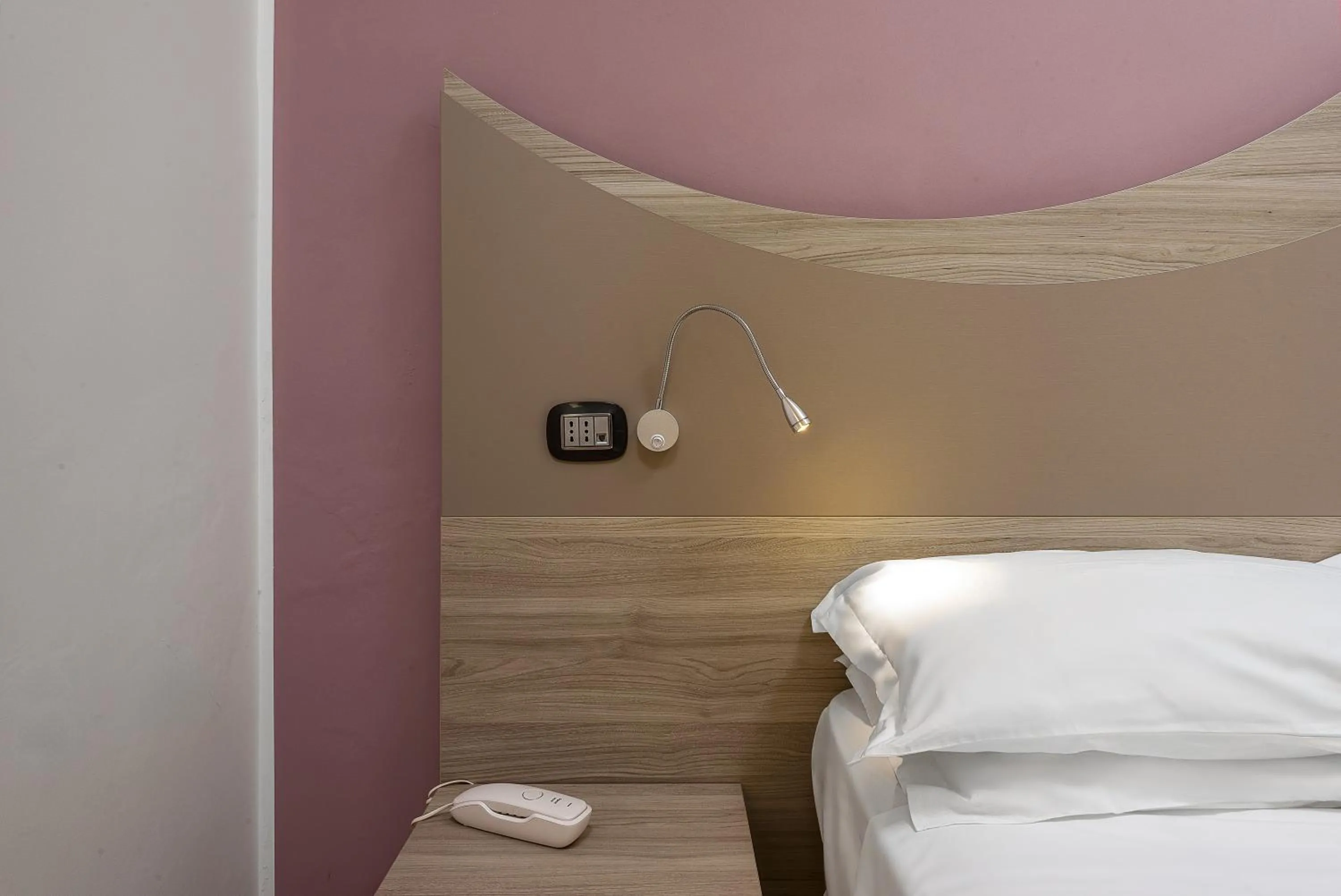 Bed in La Conchiglia sul mare Hotel