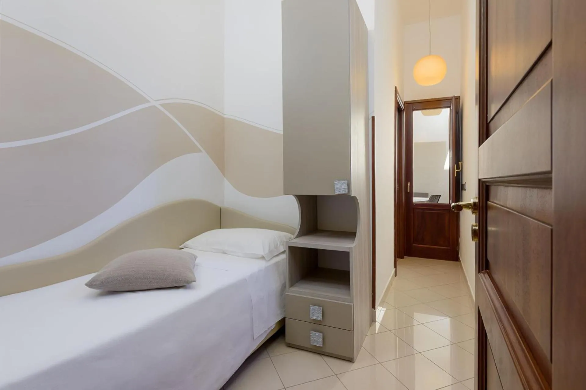 Bed in La Conchiglia sul mare Hotel