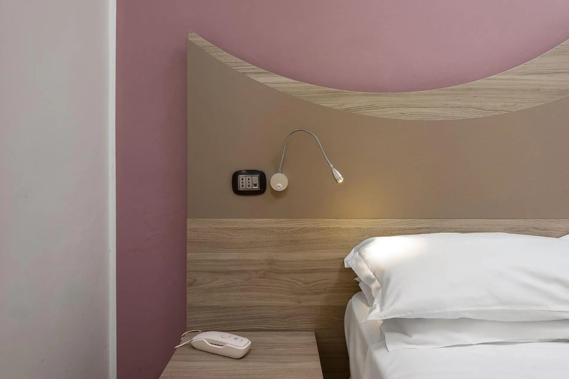 Bed in La Conchiglia sul mare Hotel