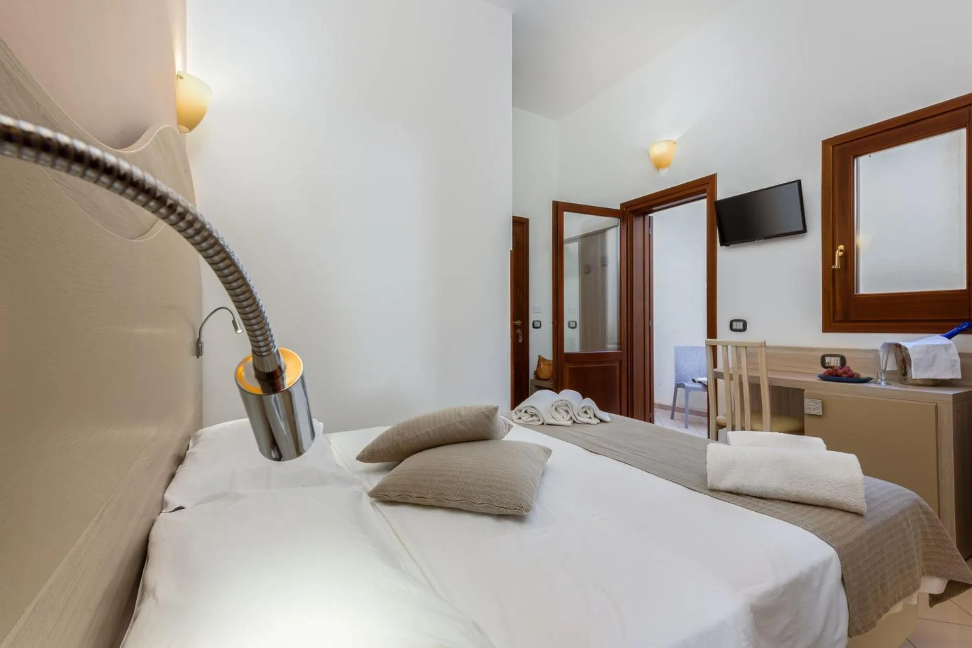 Bed in La Conchiglia sul mare Hotel