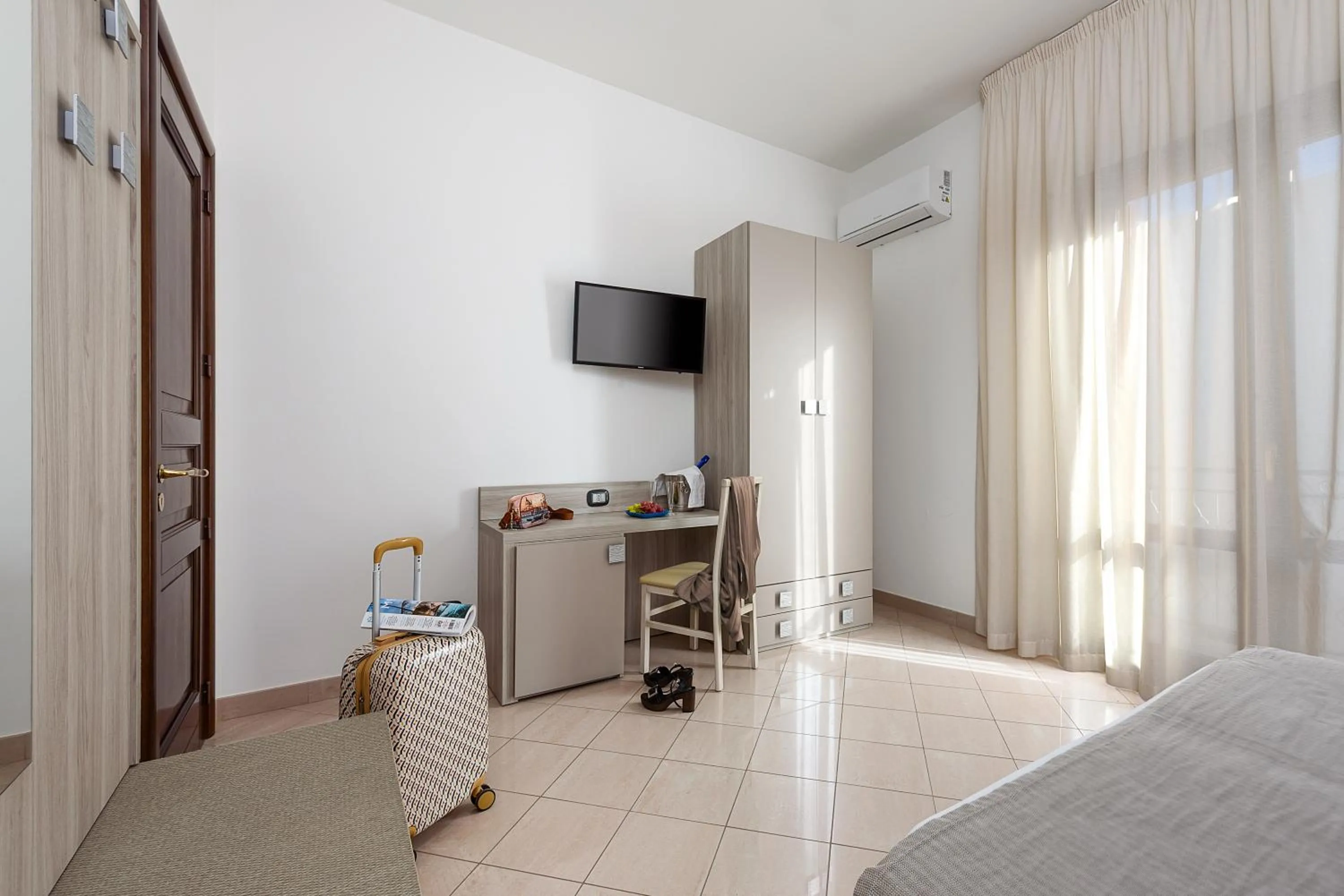 Bed in La Conchiglia sul mare Hotel