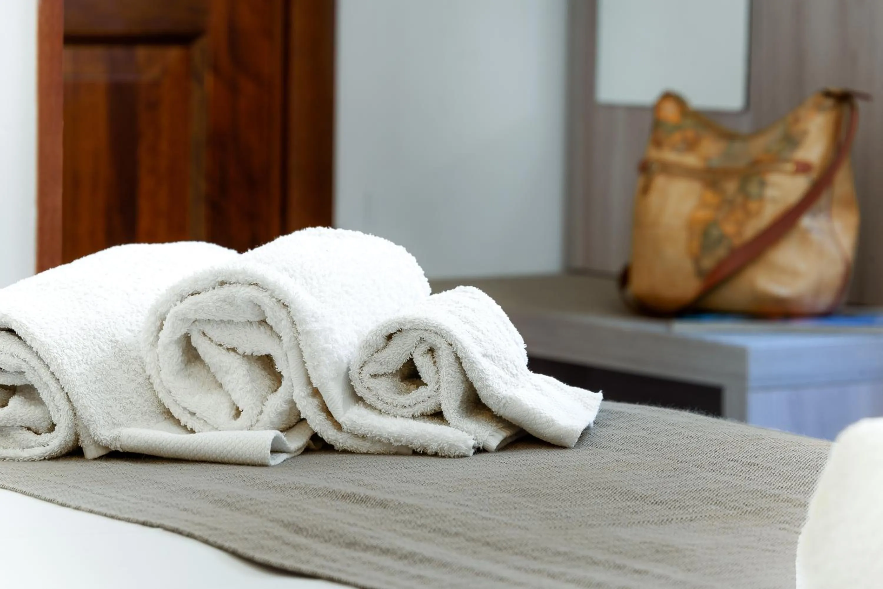 towels, Bed in La Conchiglia sul mare Hotel