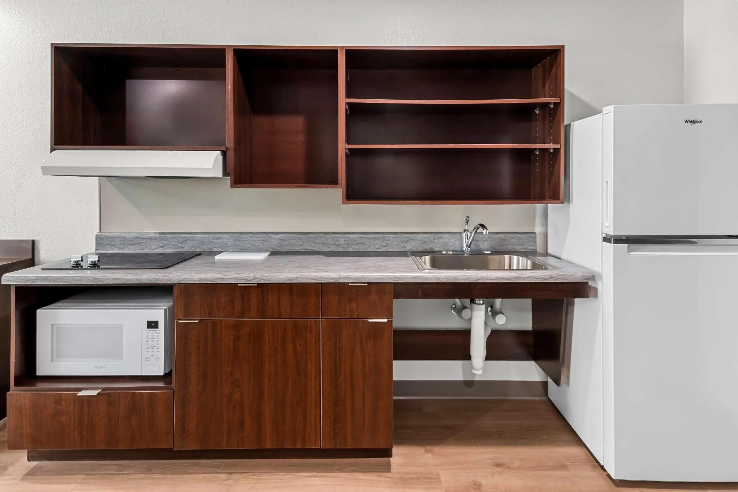 Kitchen or kitchenette in WoodSpring Suites Waco South