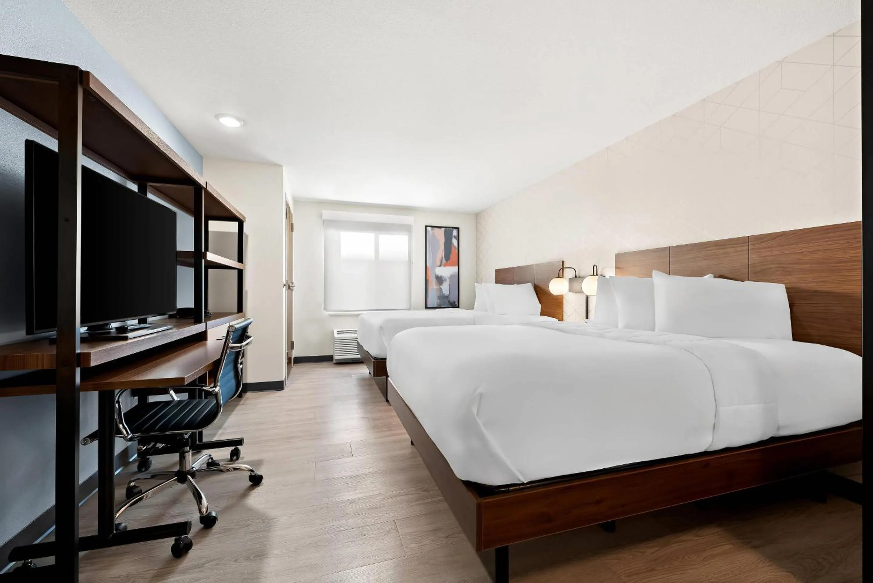 Bedroom, Bed in Everhome Suites Huntsville - Research Park
