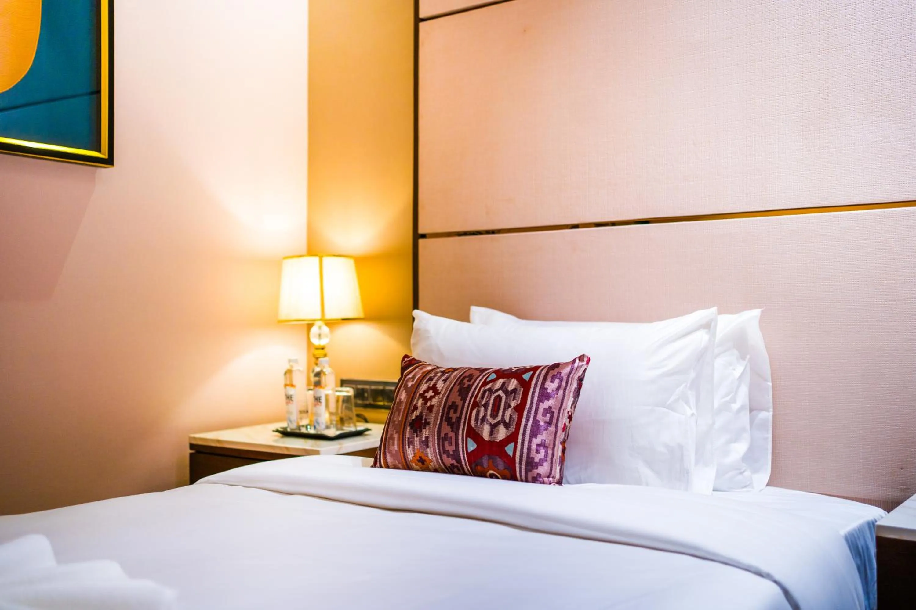 Bed in The Maple Hotel