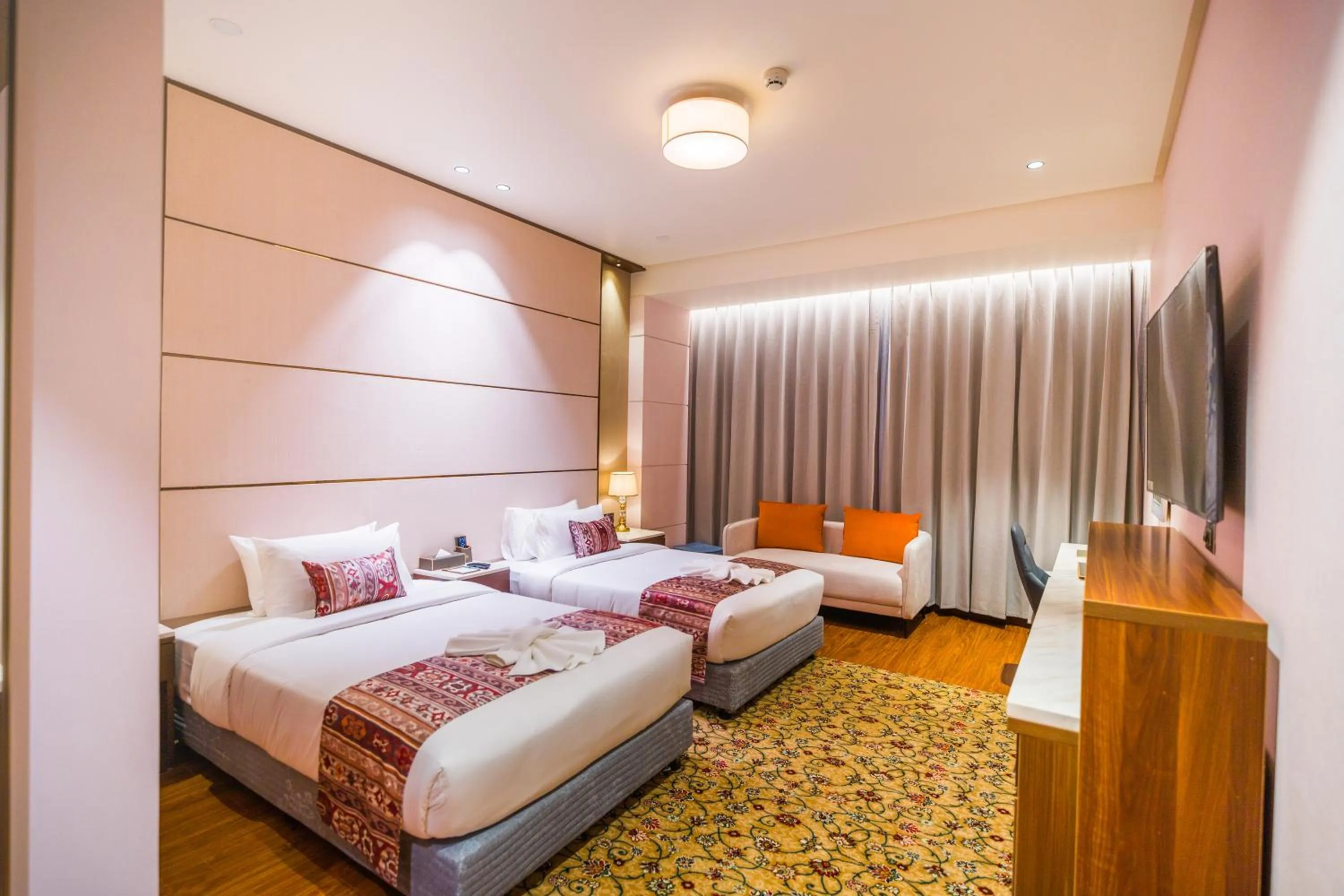 Bed in The Maple Hotel