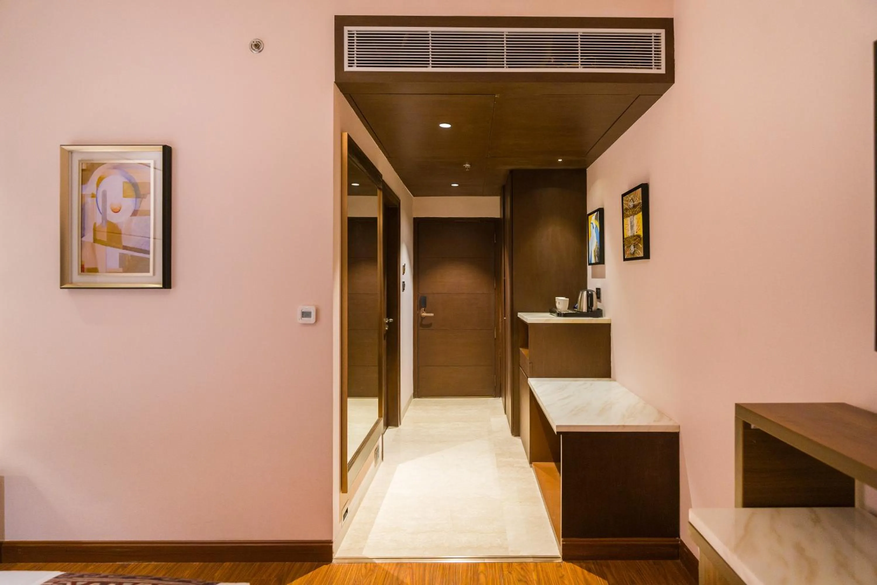 Bedroom in The Maple Hotel