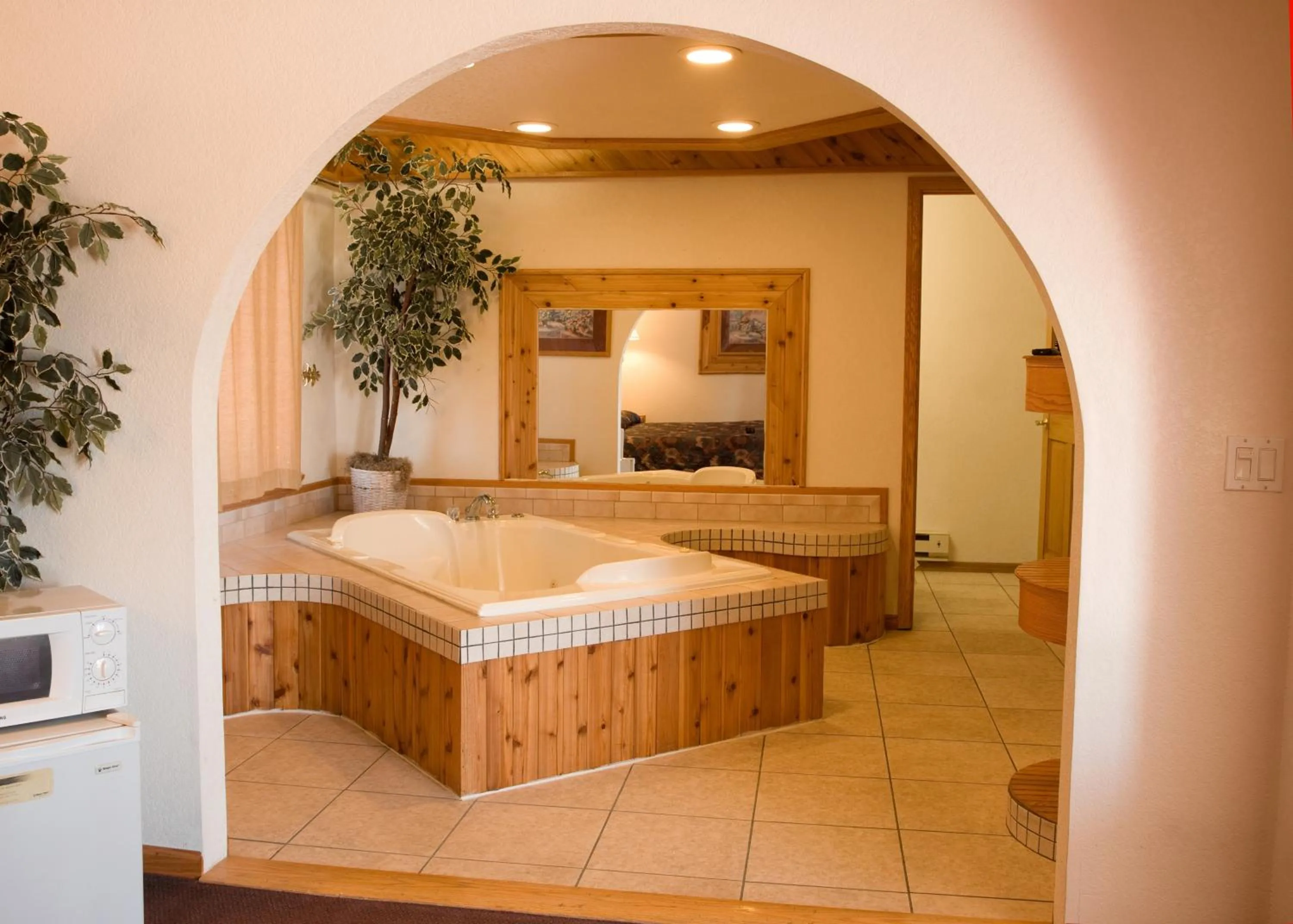 Bathroom, Bed in North Country Inn & Suites