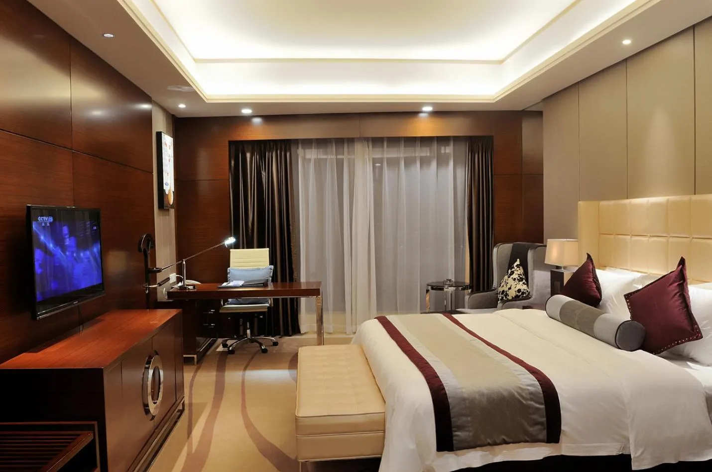 Bed in Guangzhou ChangFeng Gloria Plaza Hotel