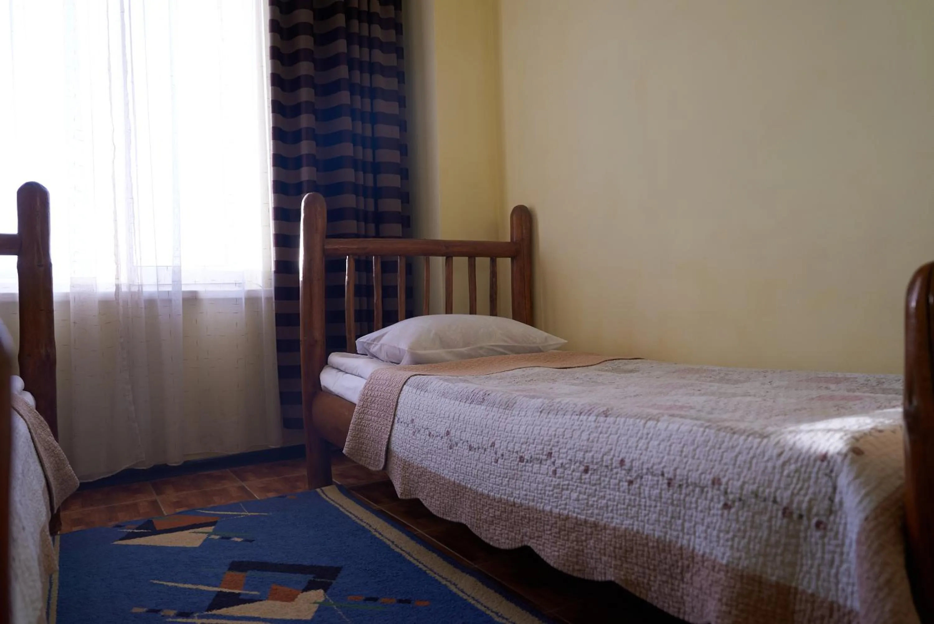 Bed in Argo Guest House