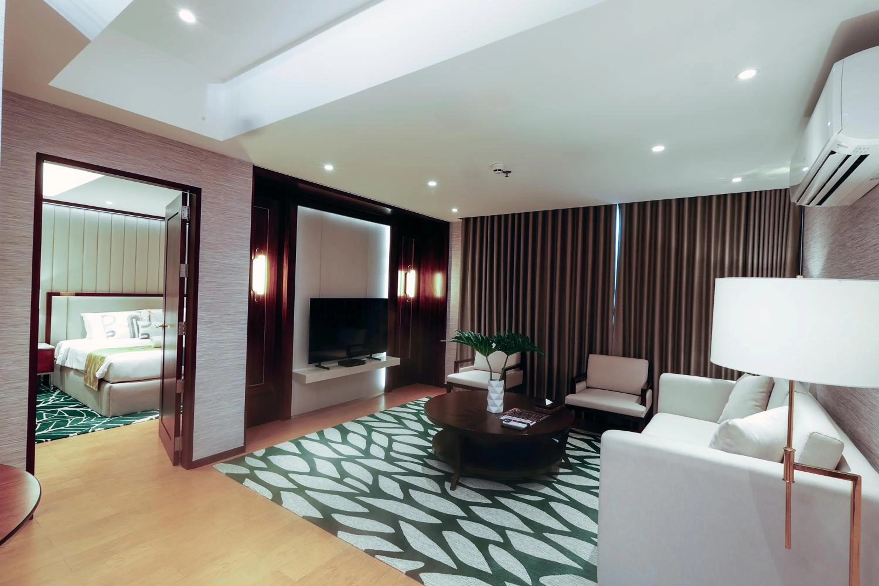 Seating area, Bed in The Harvest Hotel Managed by HII