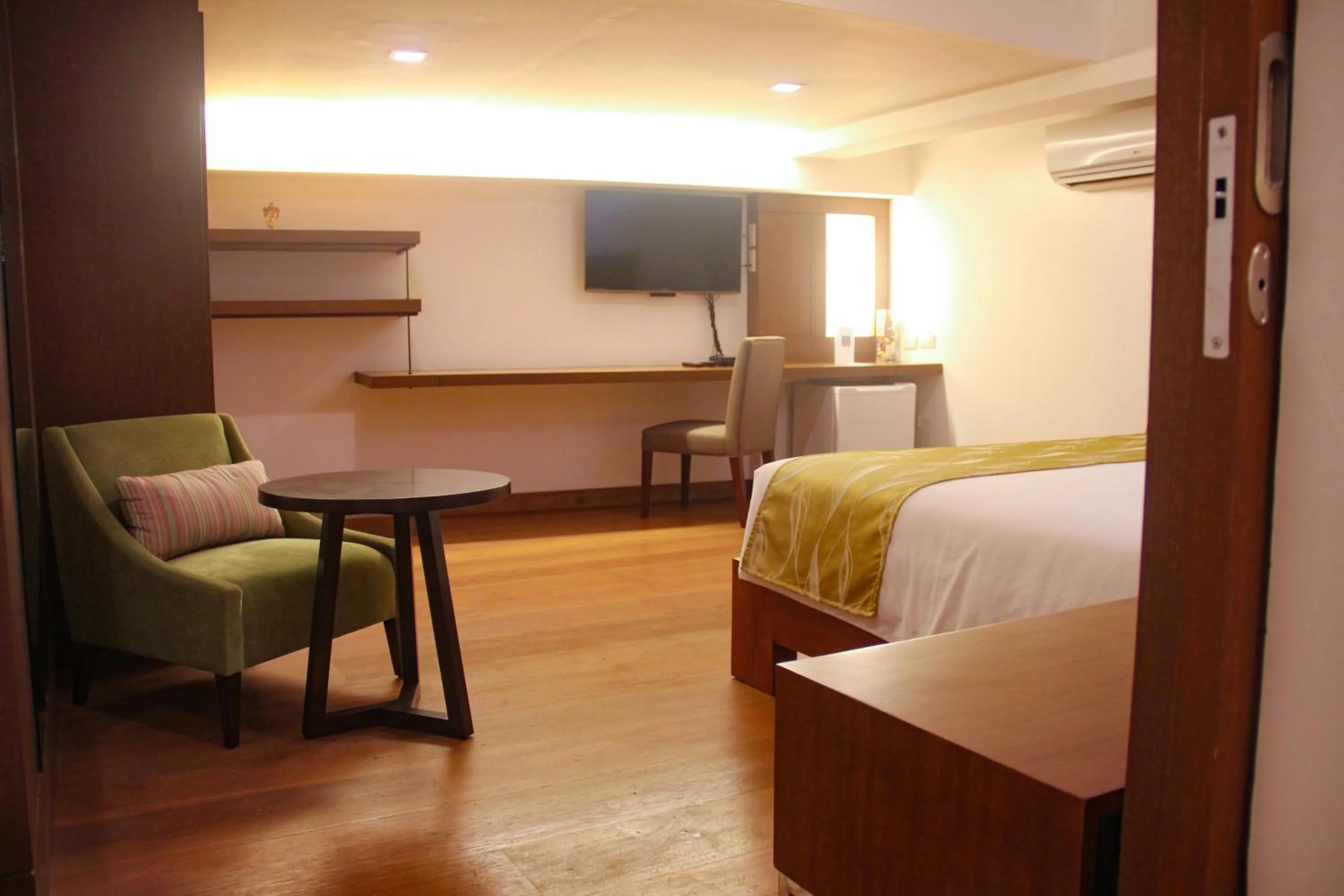 Bed in The Harvest Hotel Managed by HII