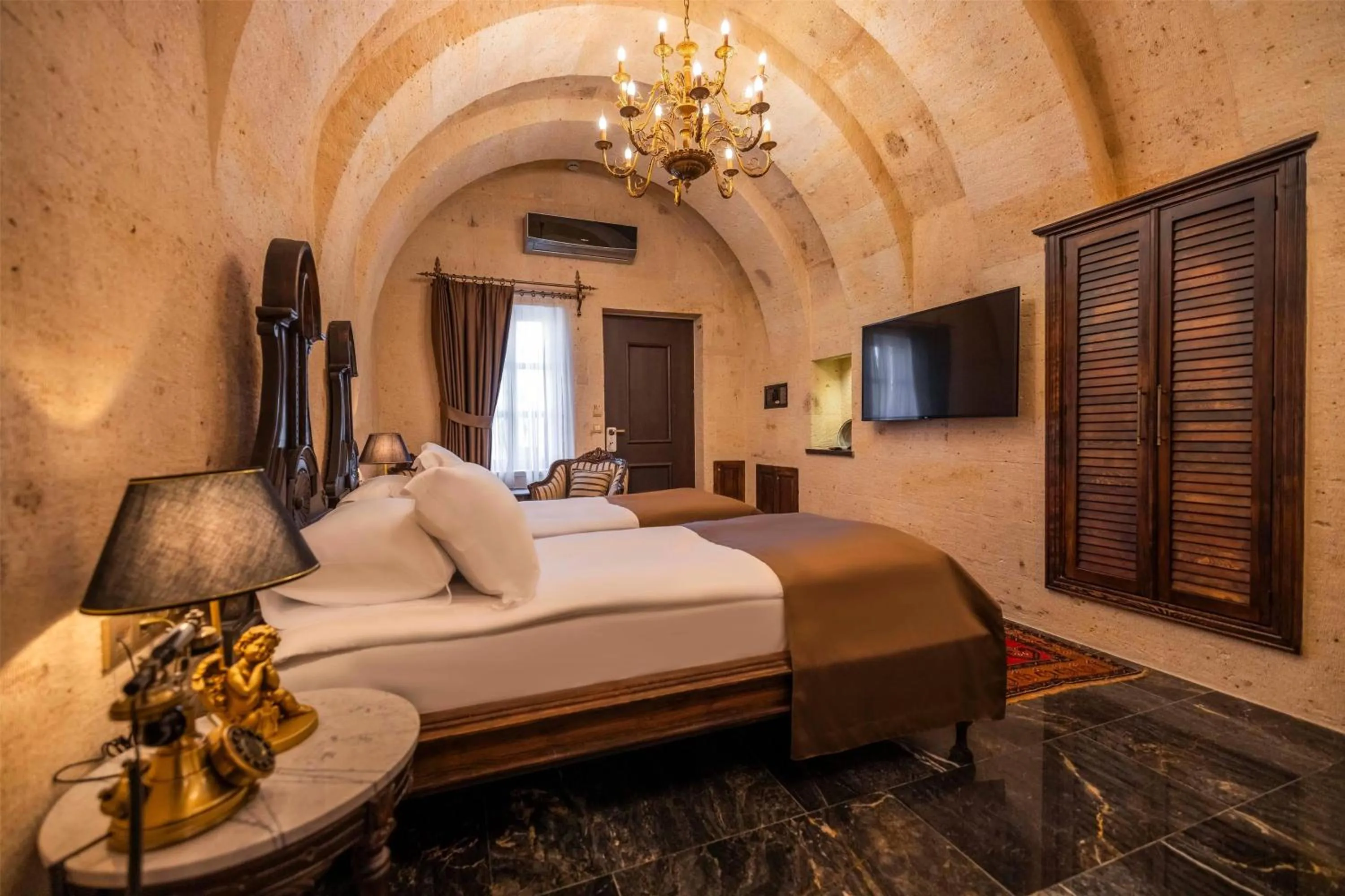 Photo of the whole room, Bed in Signature Cave Cappadocia, Trademark Collection by Wyndham