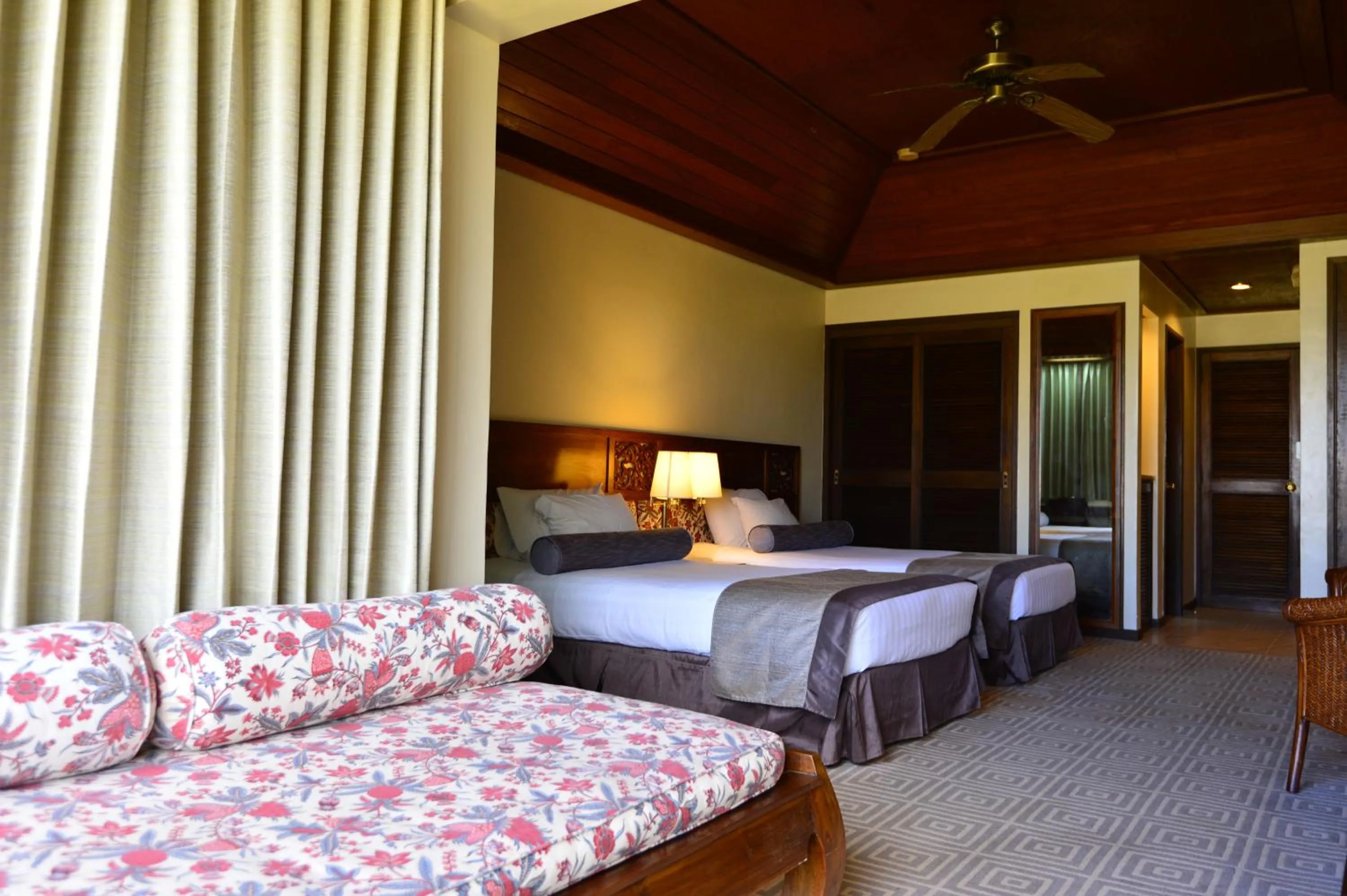 Bed in Aqua Resort Club Saipan