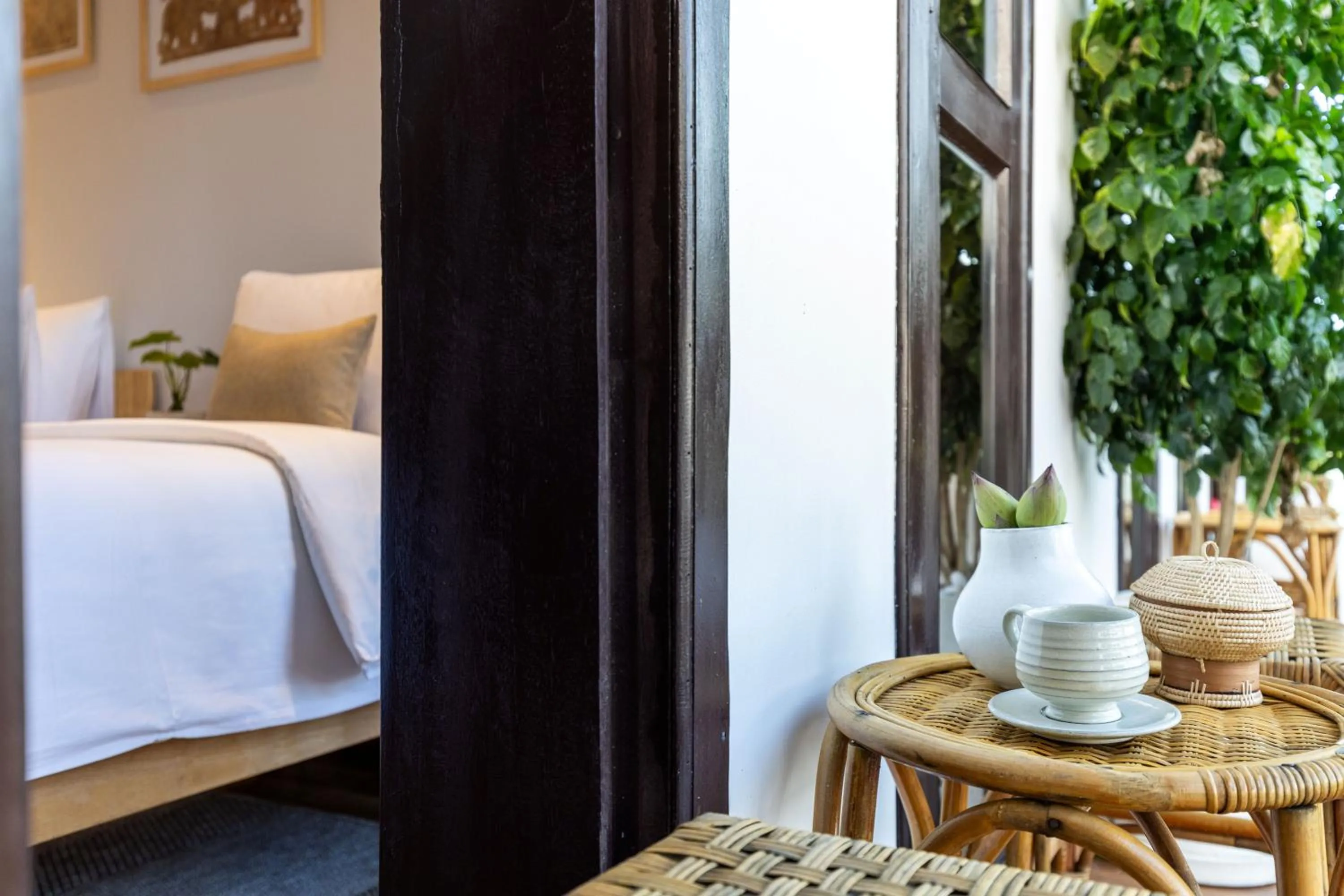 Seating area, Bed in Moringa Tree Maison