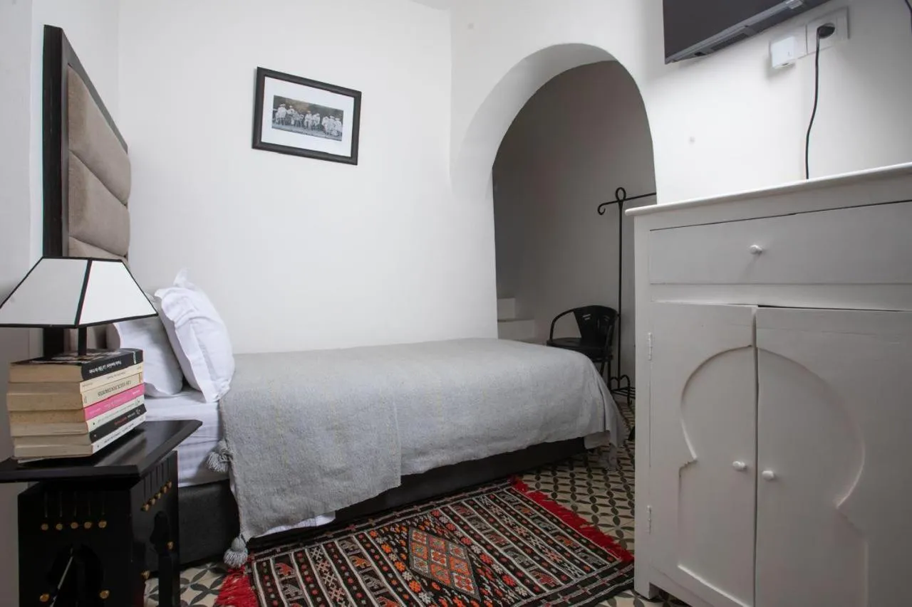 Communal lounge/ TV room, Bed in Dar Lalzohra