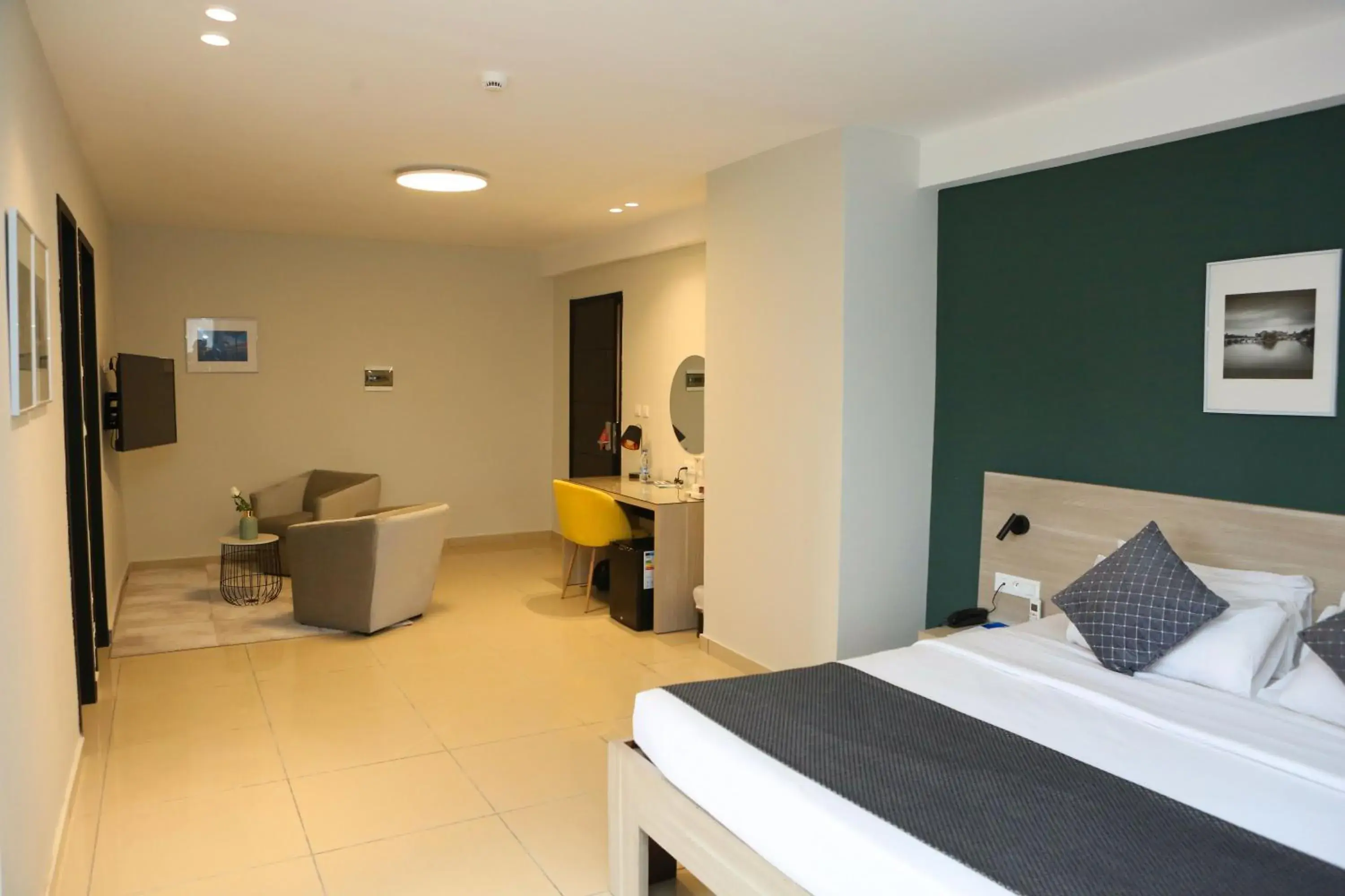 Photo of the whole room, Bed in Hôtel Ivotel Abidjan Photo of the whole room, Bed in Hôtel Ivotel Abidjan