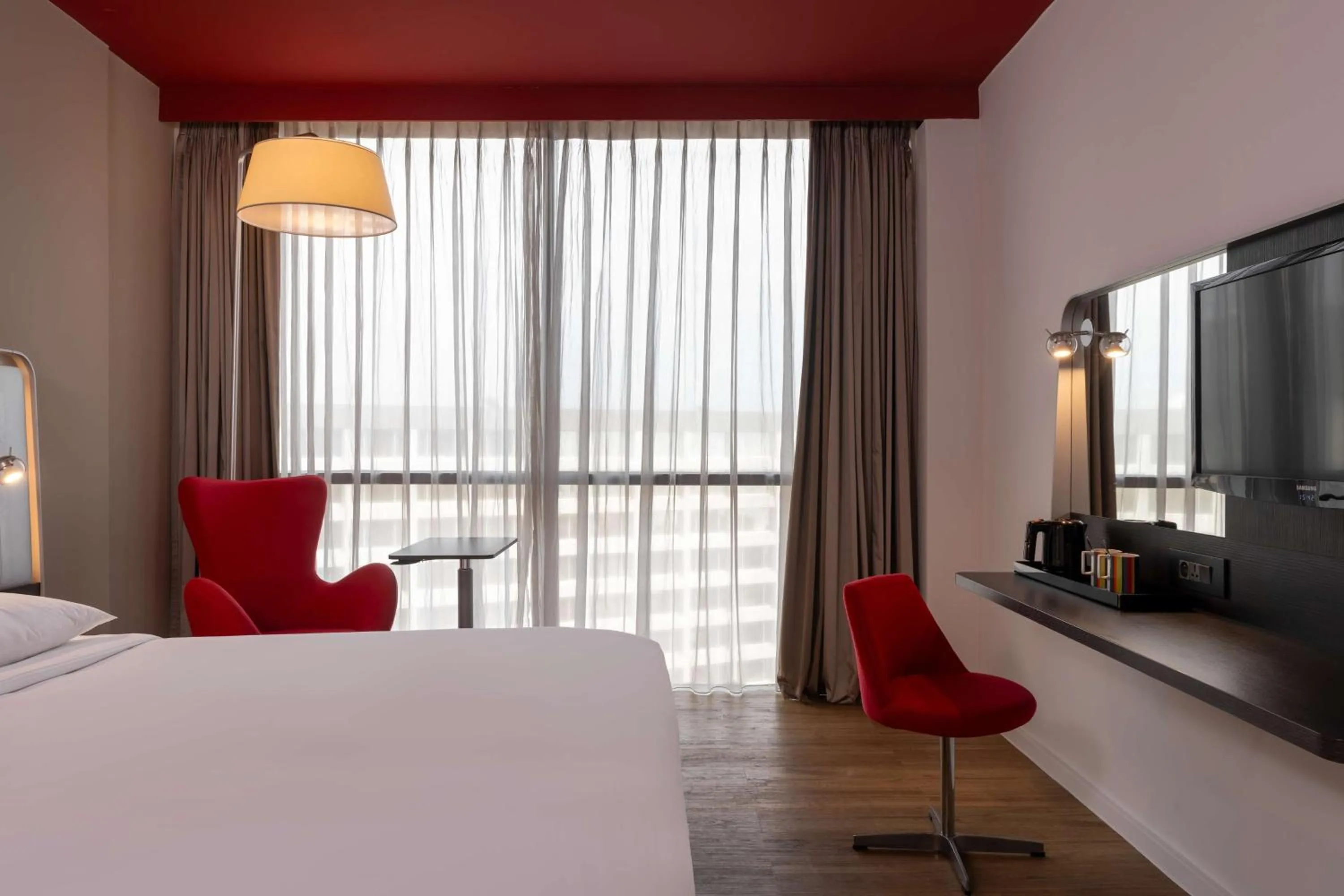 Photo of the whole room, Bed in Park Inn by Radisson Libreville