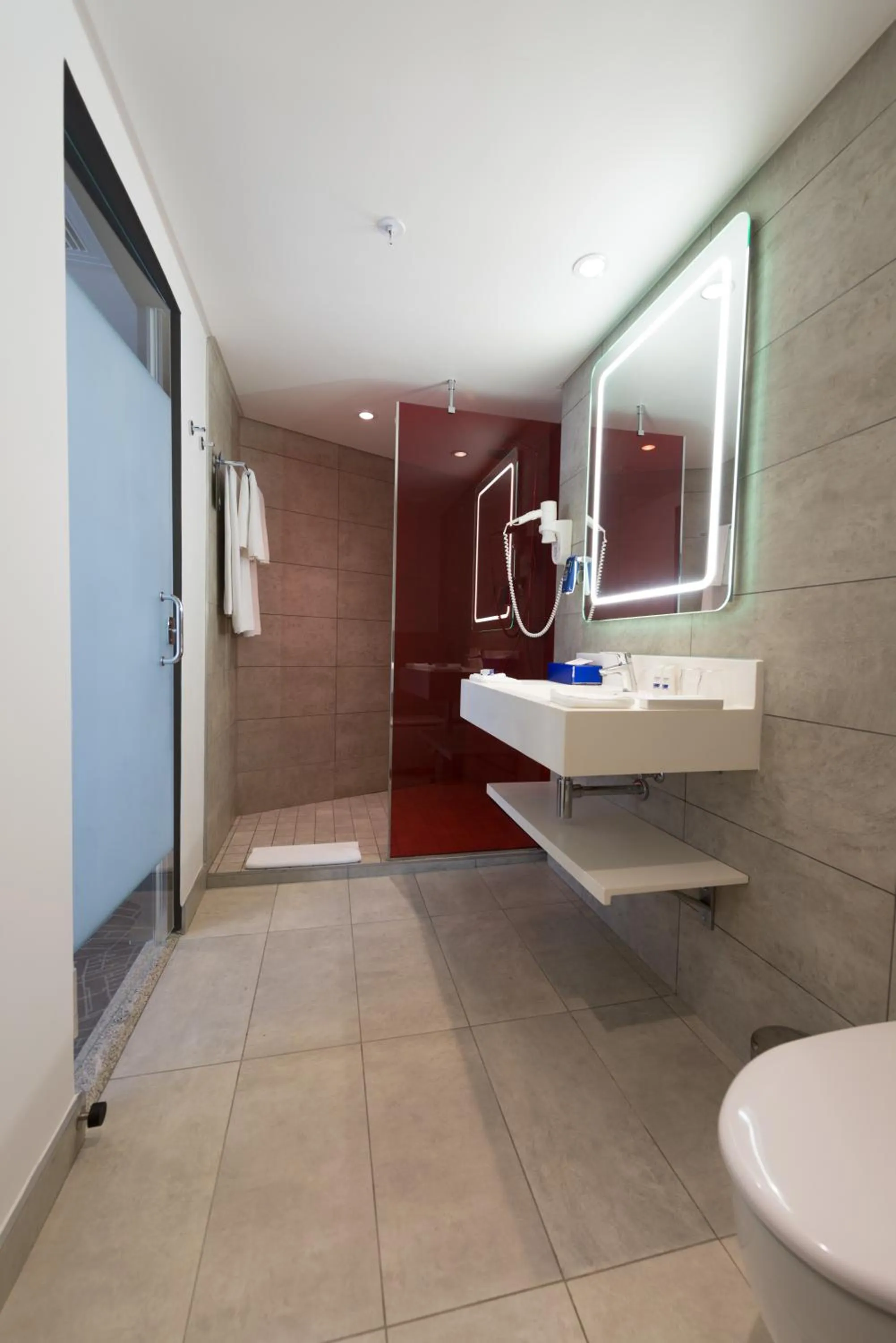 Bathroom in Park Inn by Radisson Libreville