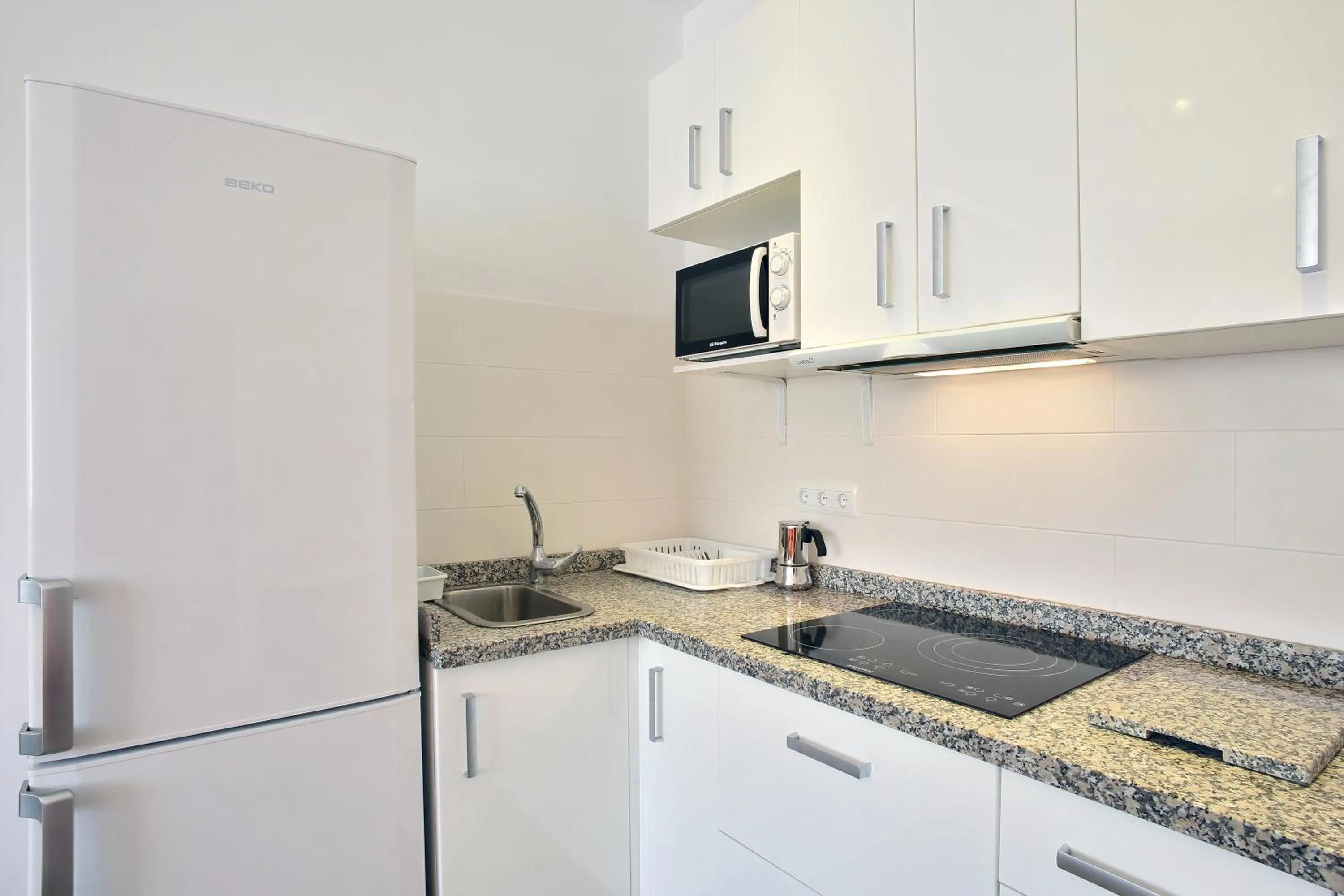 Kitchen or kitchenette in Apartamentos Ronda Luz