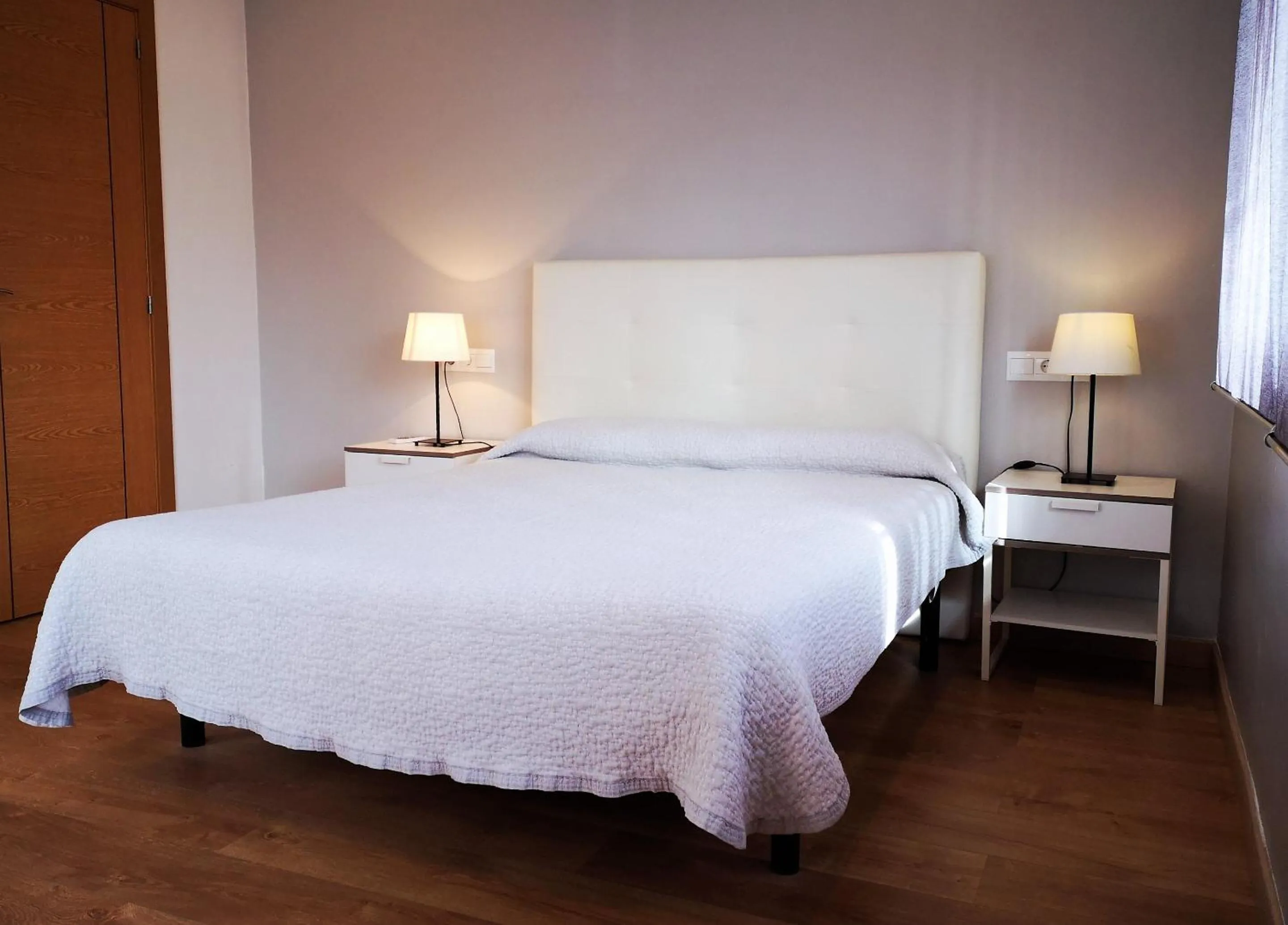 Bedroom, Bed in Apartamentos Ronda Luz