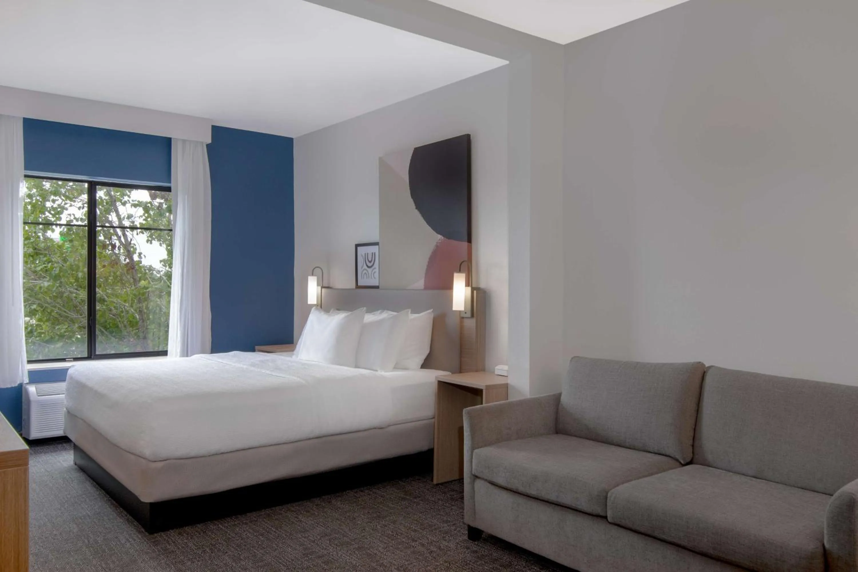 Living room, Bed in Spark by Hilton Montgomery EastChase