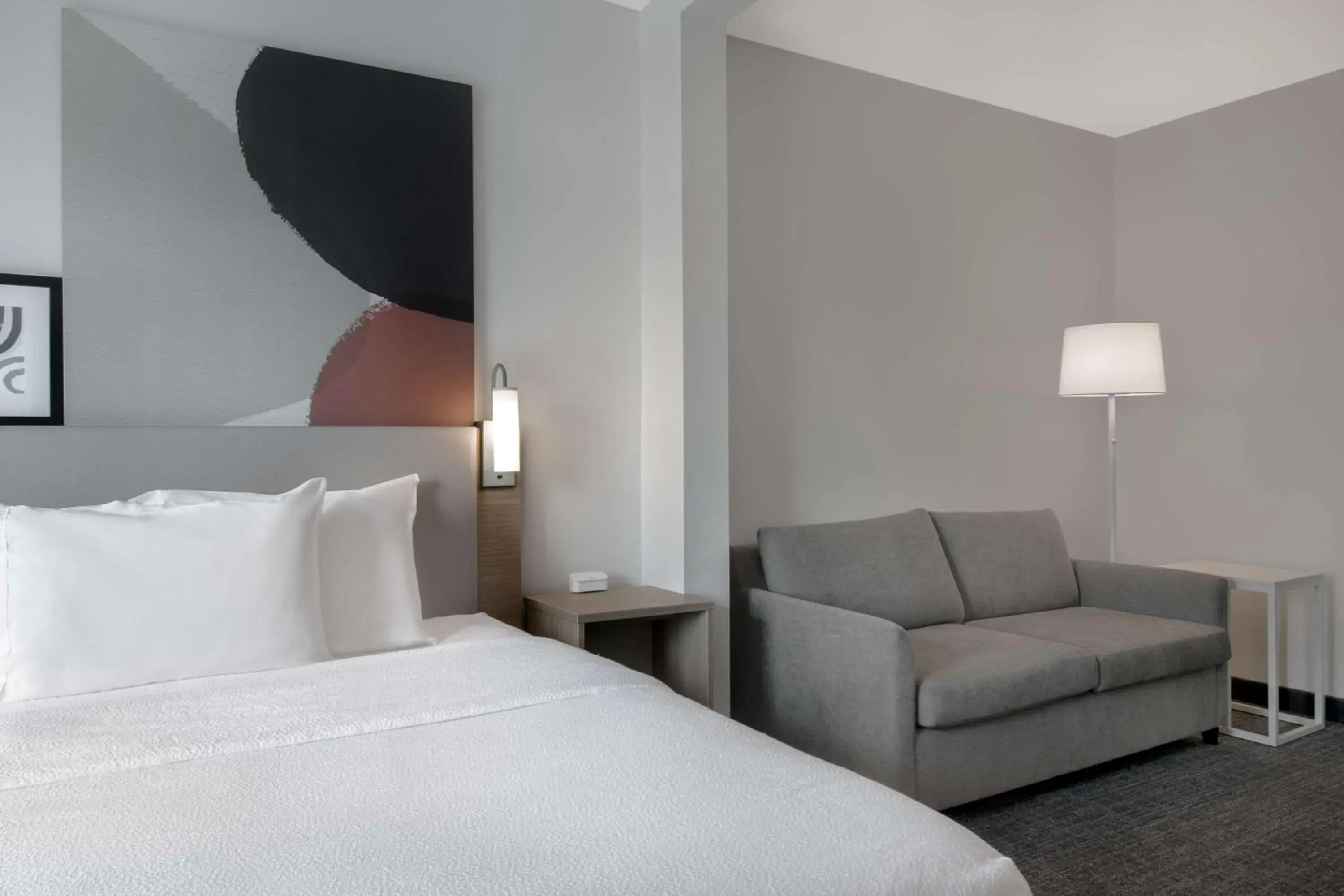 Living room, Bed in Spark by Hilton Montgomery EastChase Living room, Bed in Spark by Hilton Montgomery EastChase