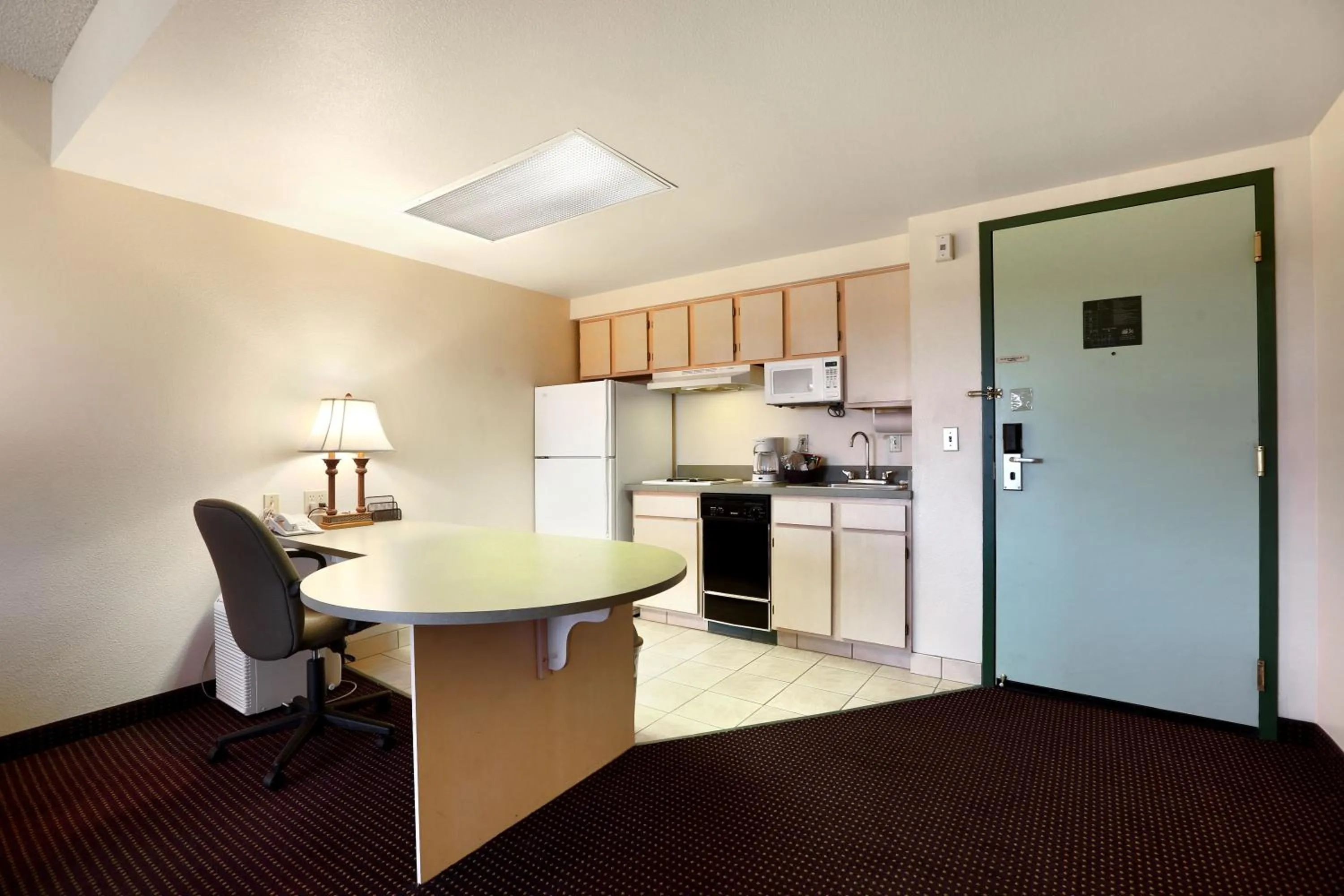 Kitchen or kitchenette in Allure Suites of Fort Myers