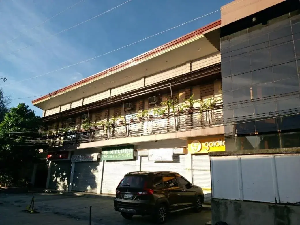 Property building in Maya Suites Badian powered by Cocotel Property building in Maya Suites Badian powered by Cocotel