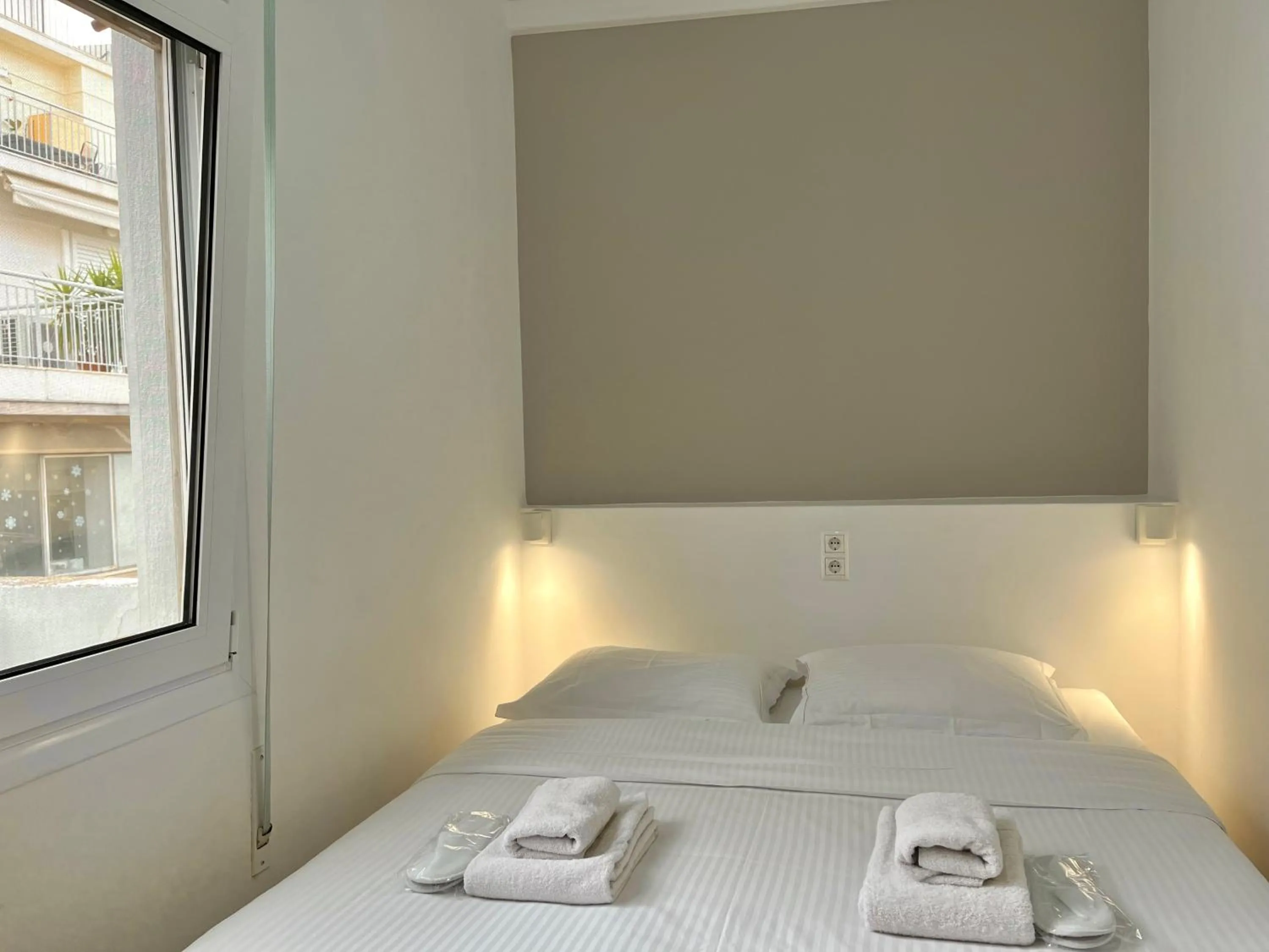 Bed in Mosaikon Guesthouses #Miltiadou Str
