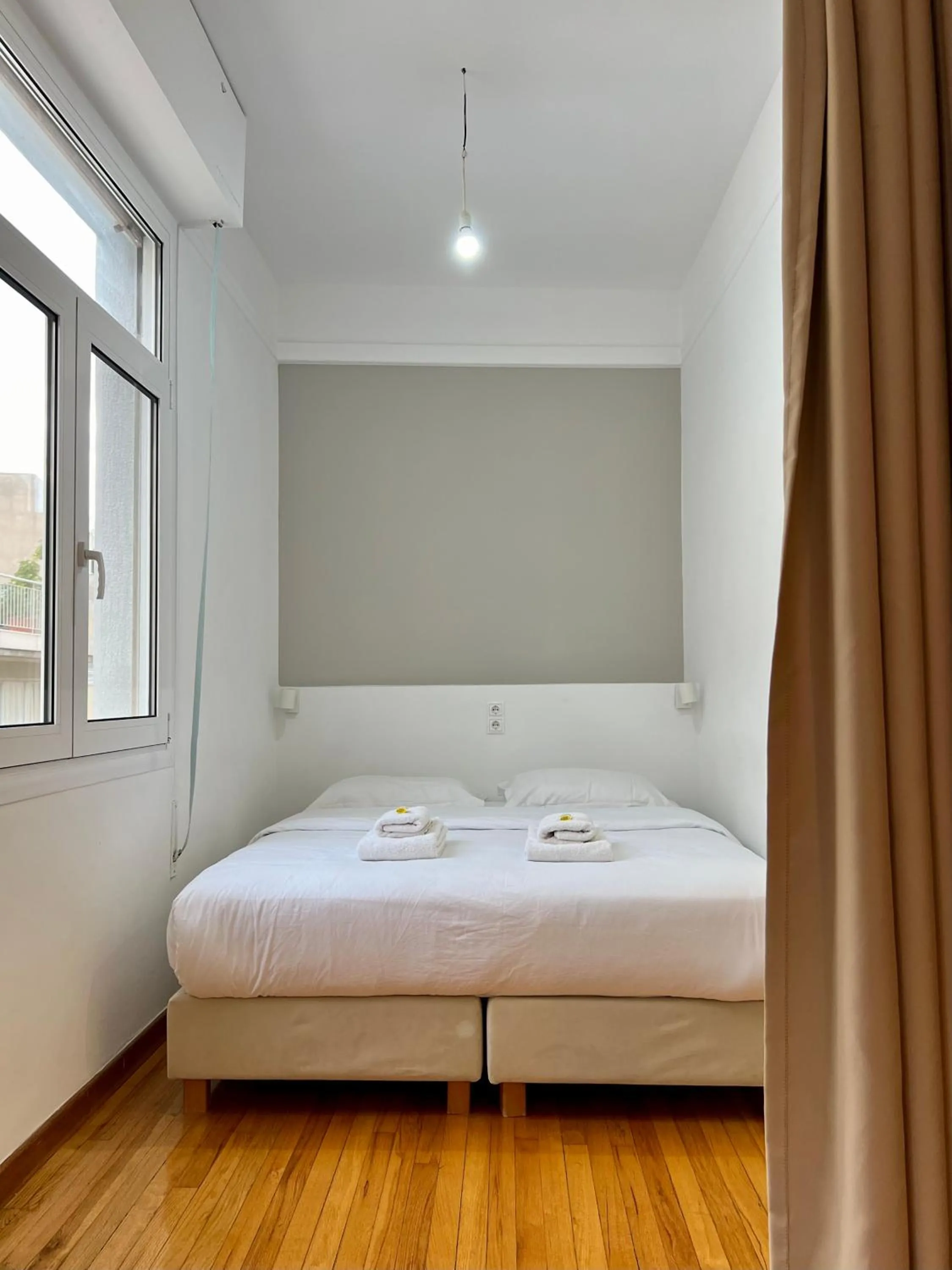 Bed in Mosaikon Guesthouses #Miltiadou Str