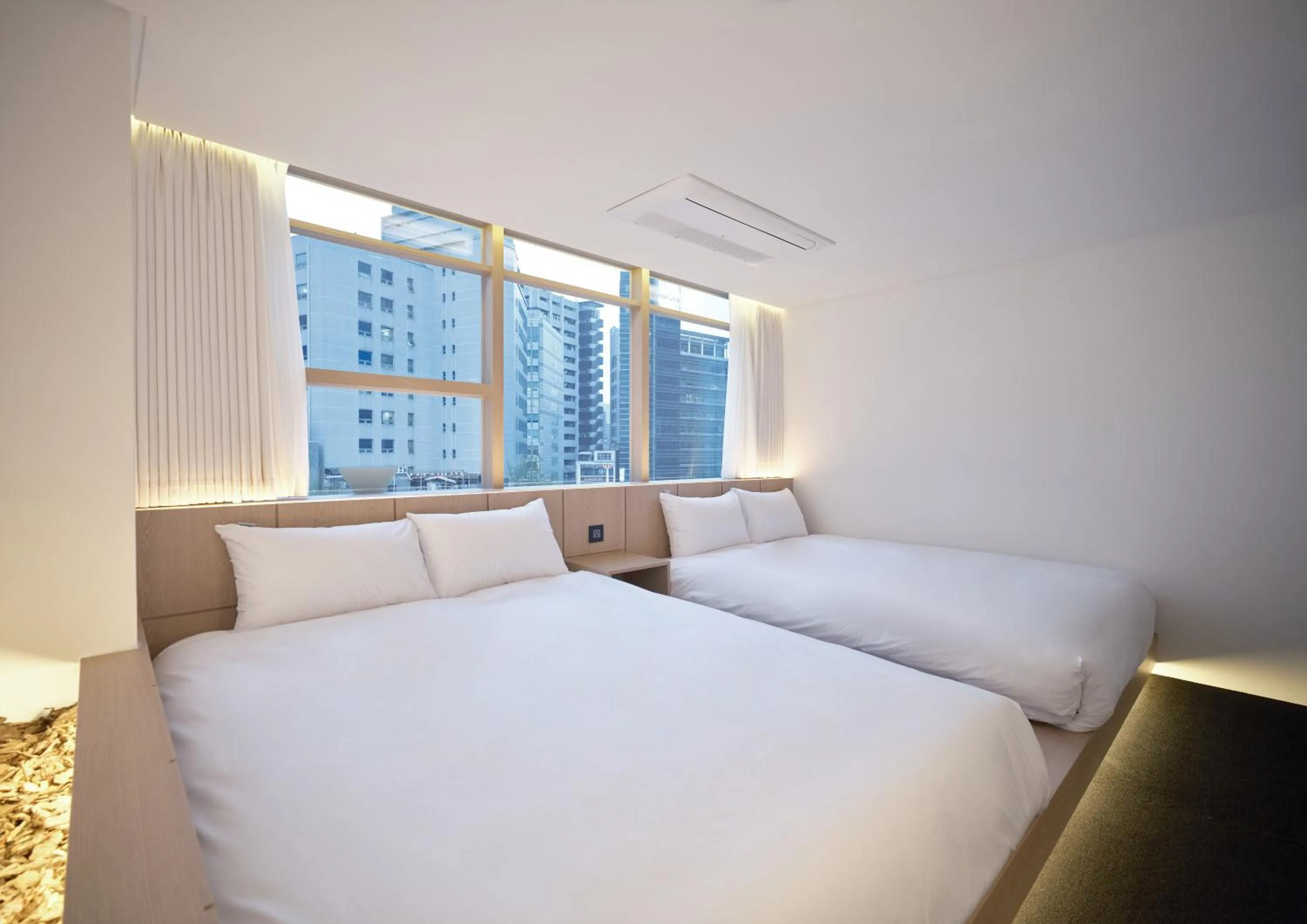 Bed in UH Suite Seoul Deoksugung