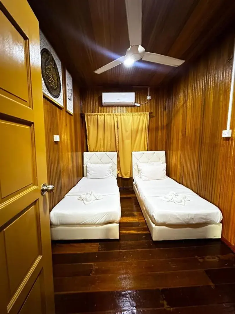 Bed in Panglima Resort Bum Bum Island, Semporna Bed in Panglima Resort Bum Bum Island, Semporna
