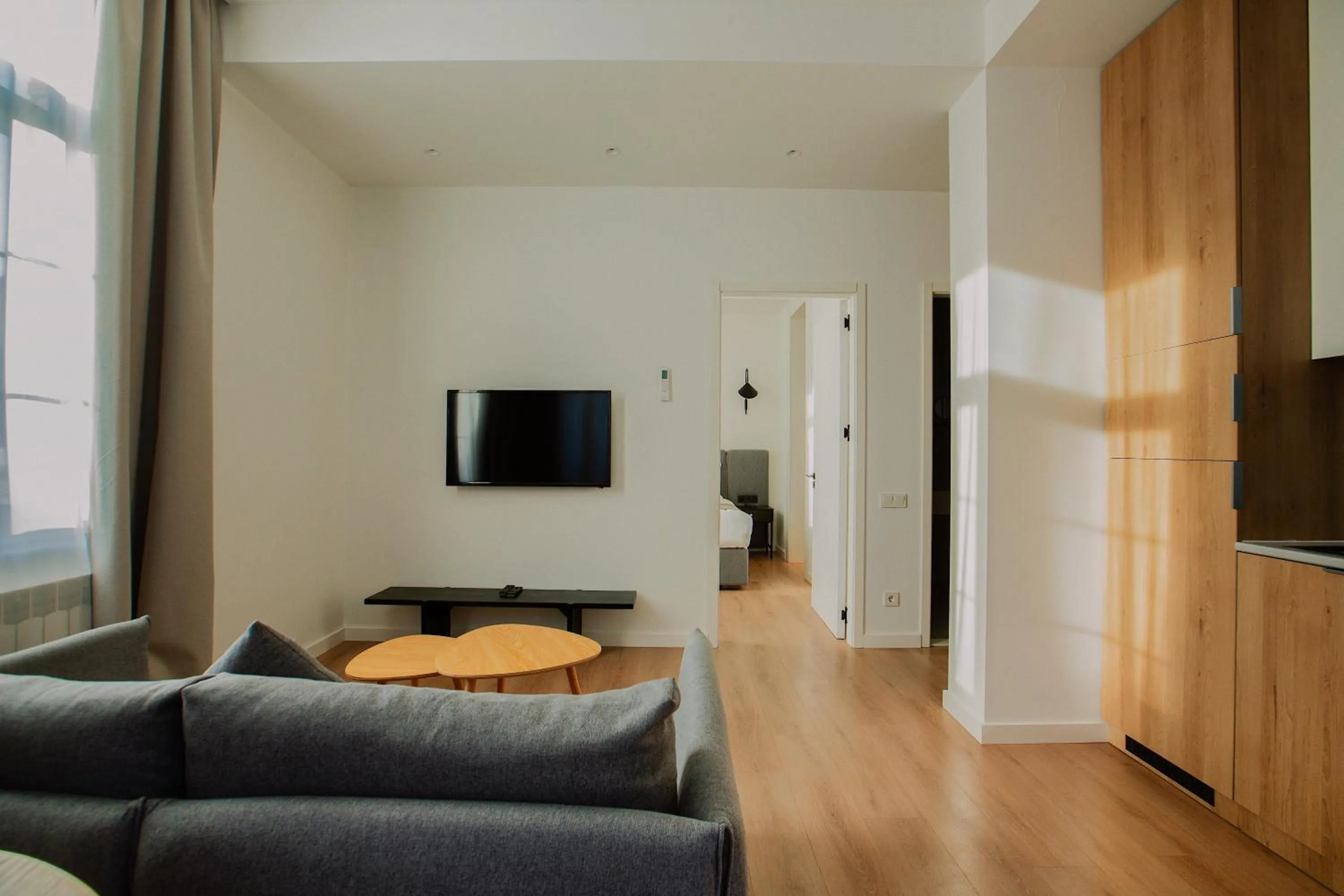 Communal lounge/ TV room in Artifact Apart Hotel