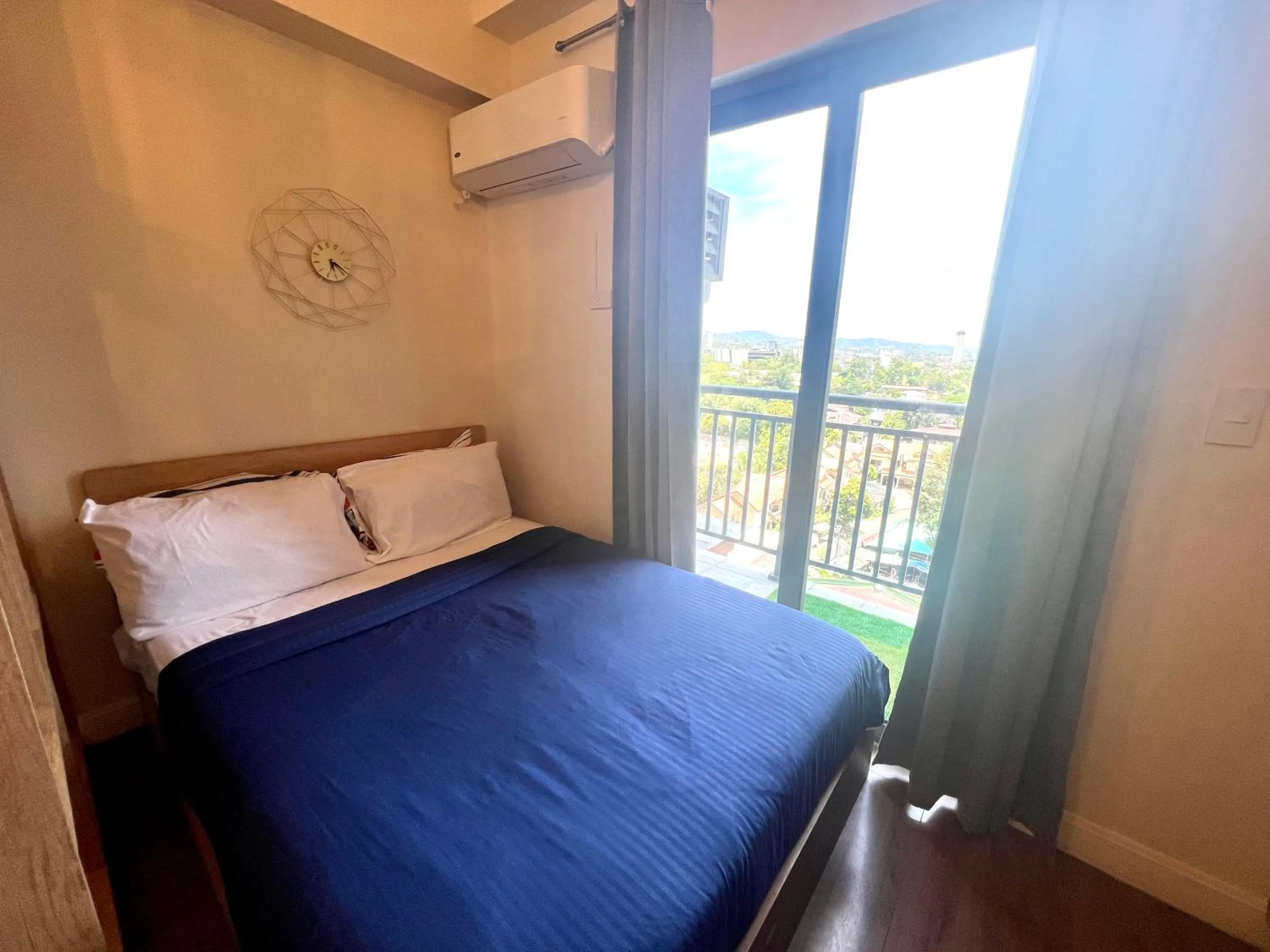 Bed in Grand Residences by Isla Stays