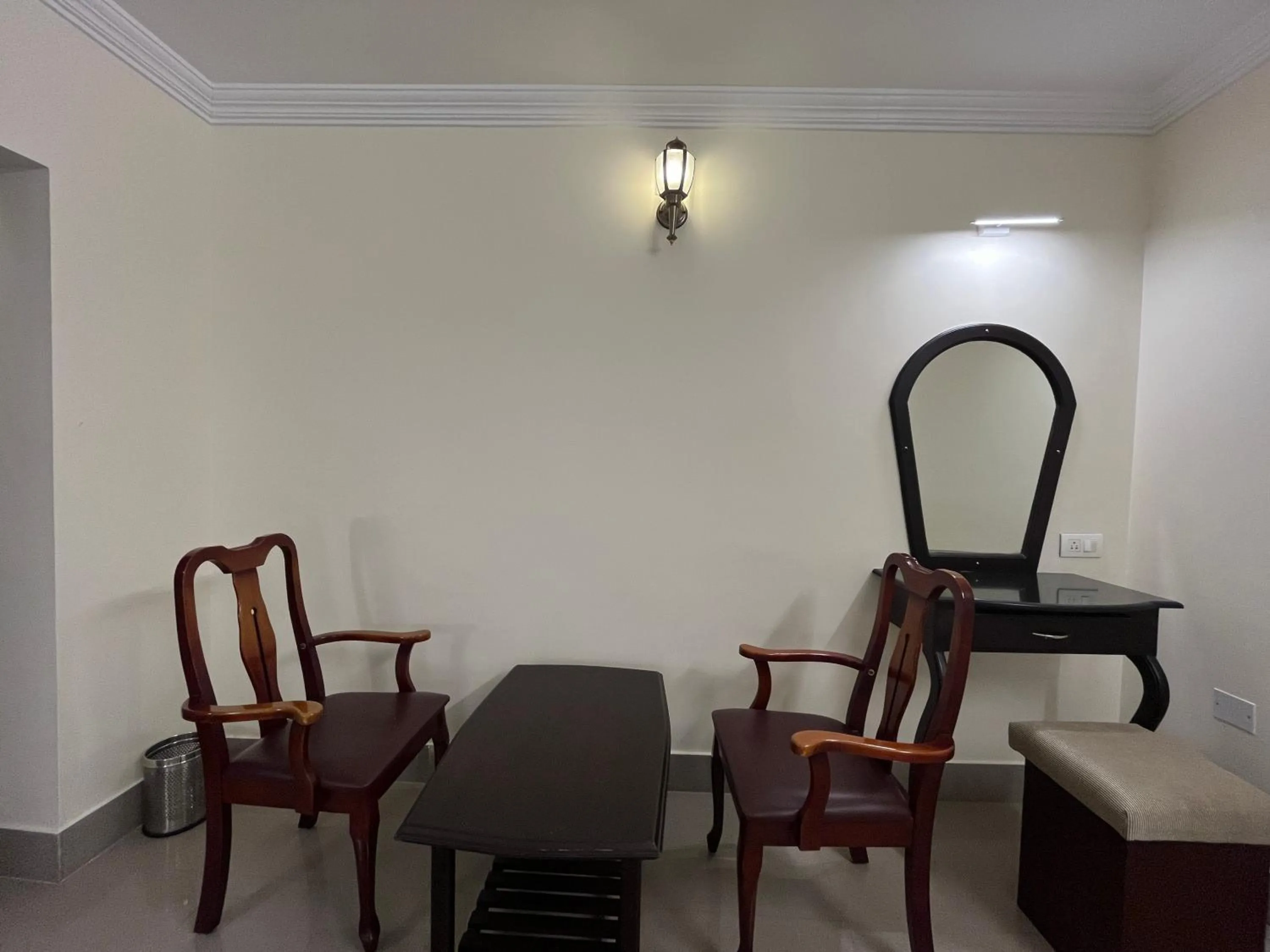 Seating area in Malanadu Tourist Home