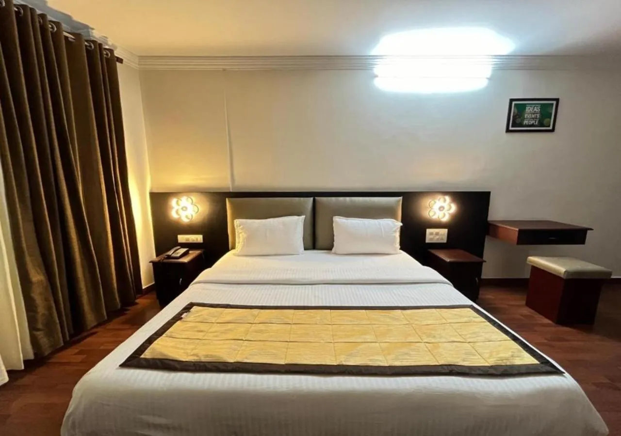 Photo of the whole room, Bed in Malanadu Tourist Home