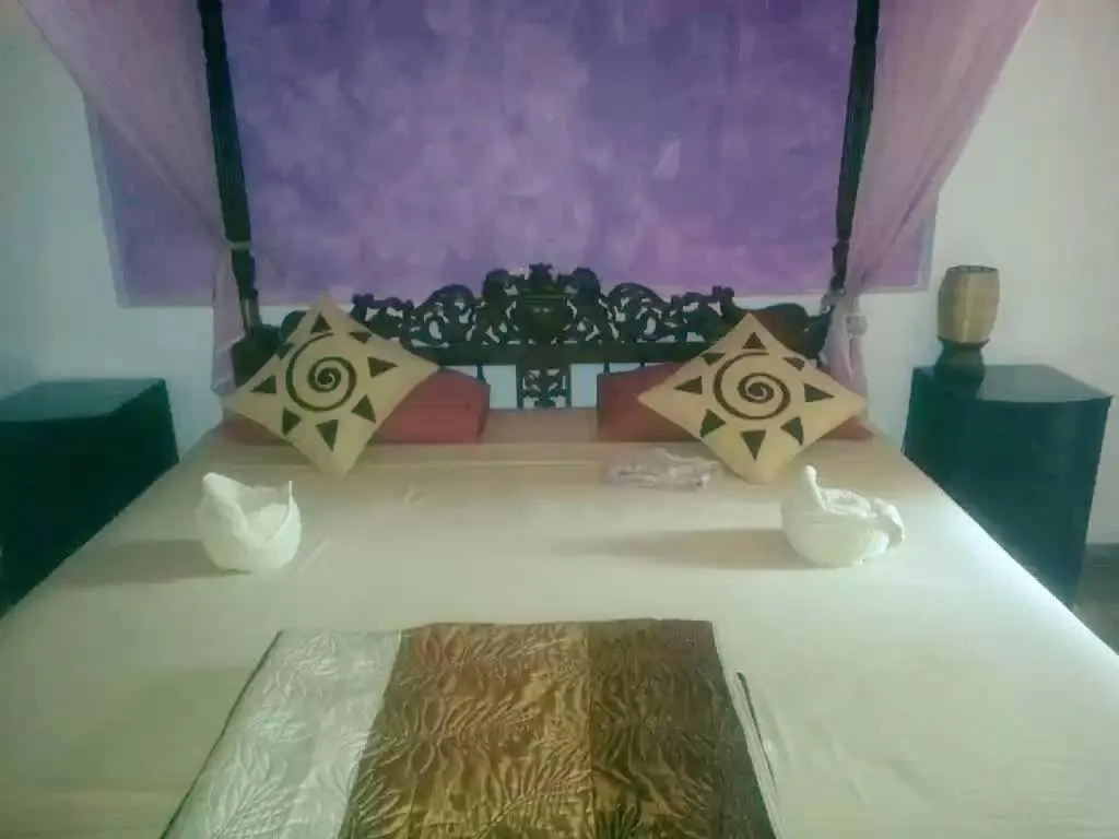 Property building, Bed in Solomon Beach Hotel