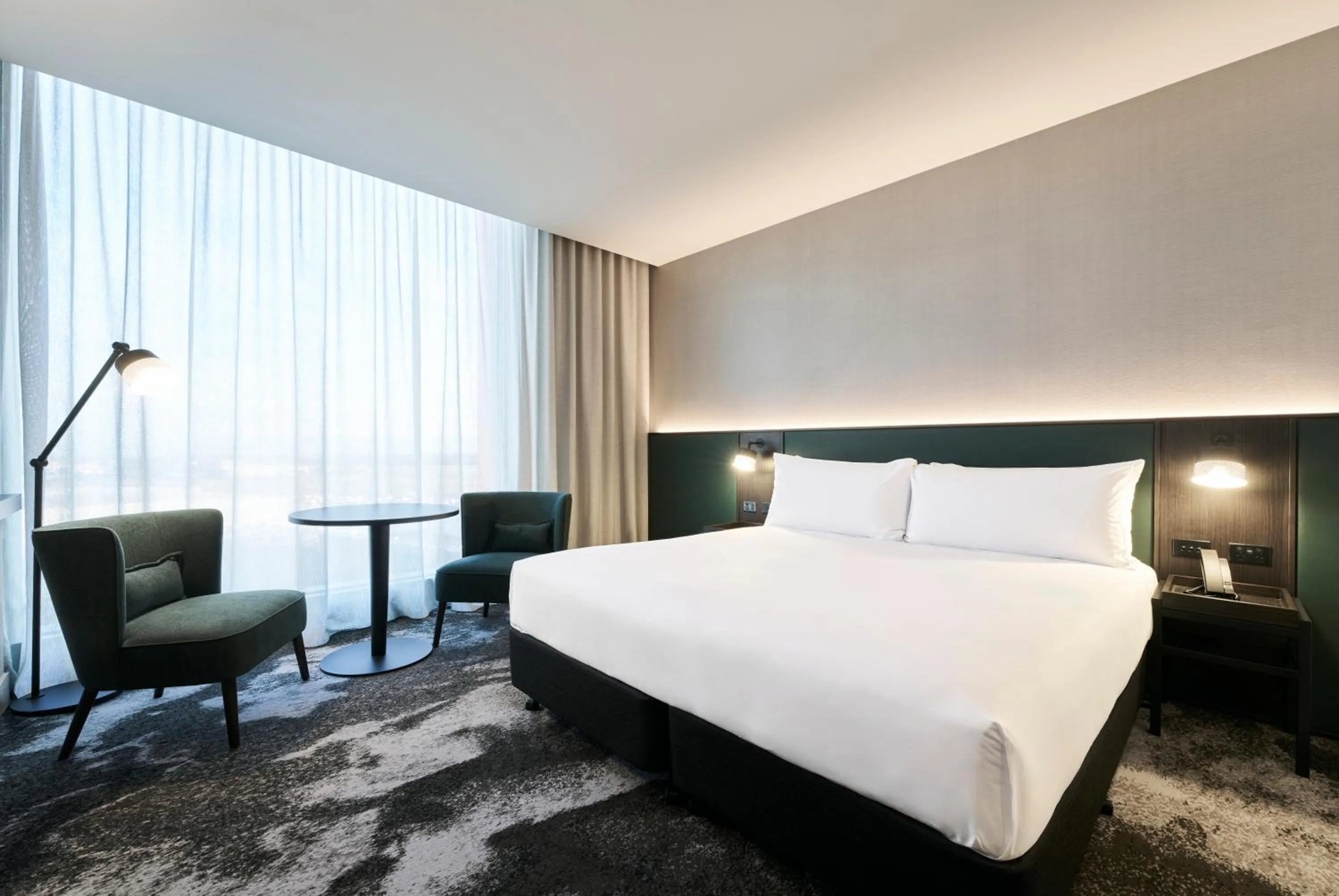 Bed in Novotel Melbourne Airport